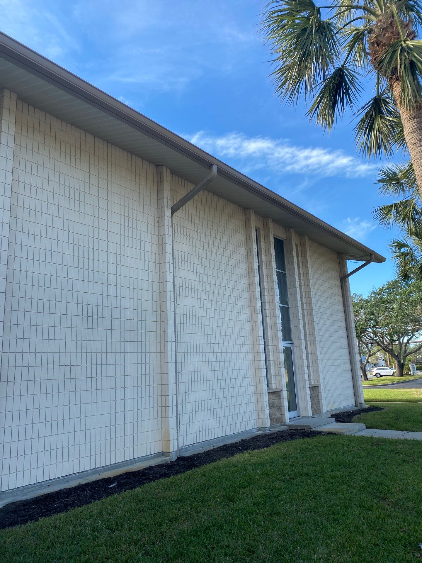 Grey Aluminum Gutters with Downspouts in Sarasota FL by Gutter Professors