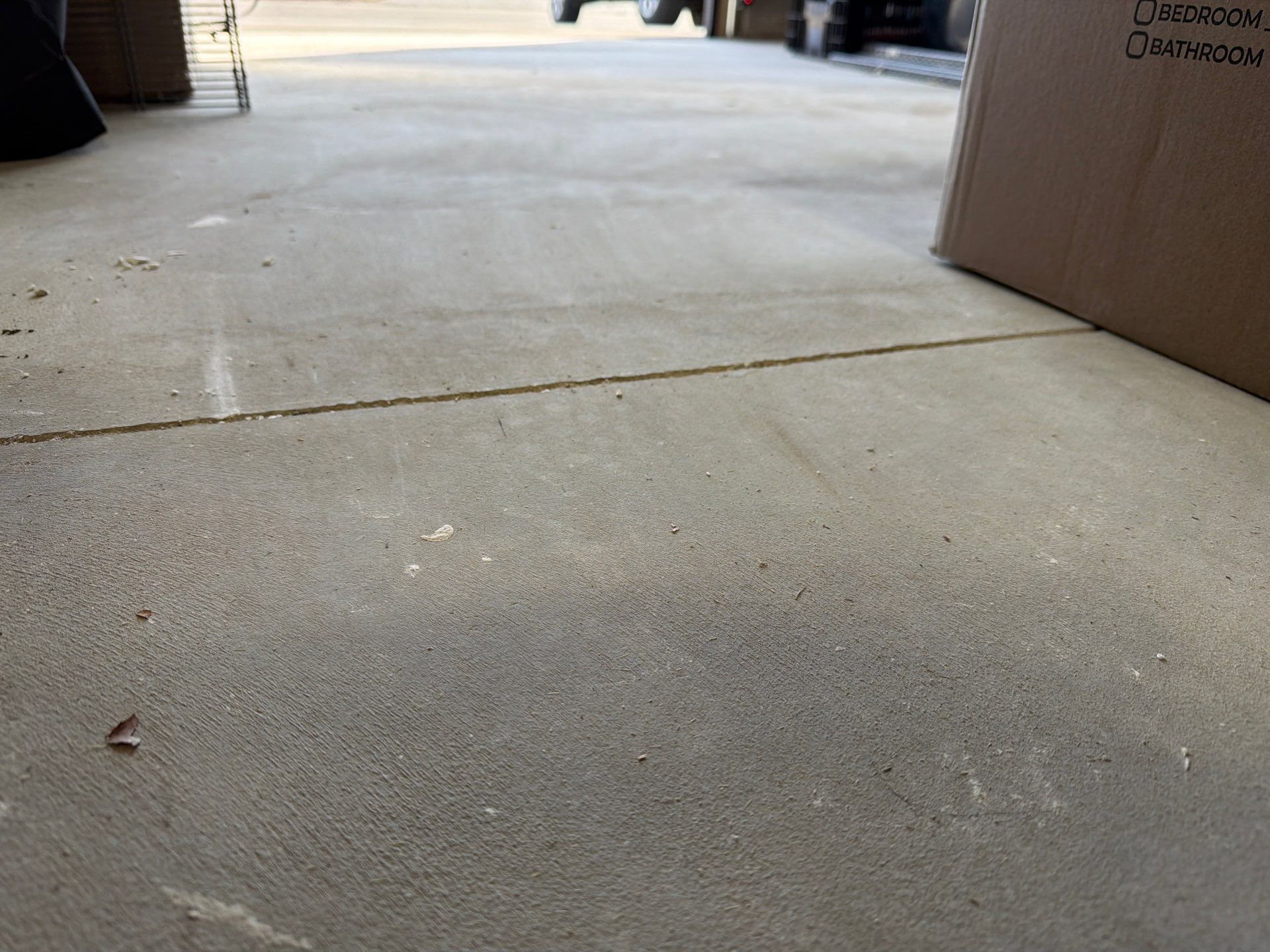 Decorative Flake Garage Floor Coating Installation in Tea, South Dakota by Select Painting, Coatings & Garage Cabinets