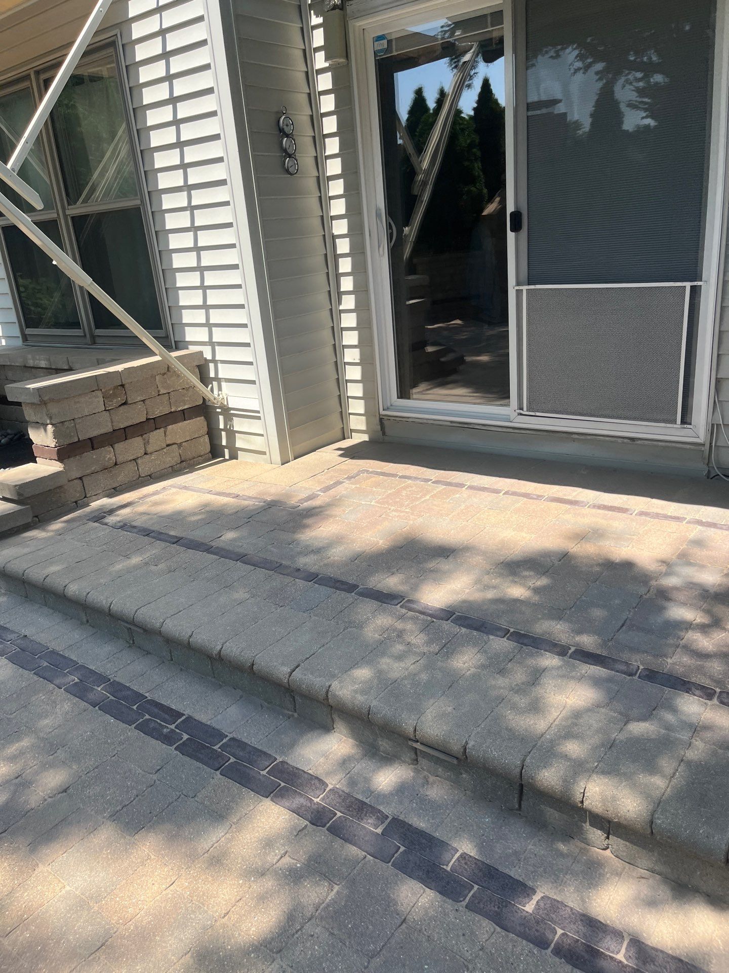 Brick paver clean, sand and seal.  using Polysweep polymeric sand by Northern Power Washing LLC.