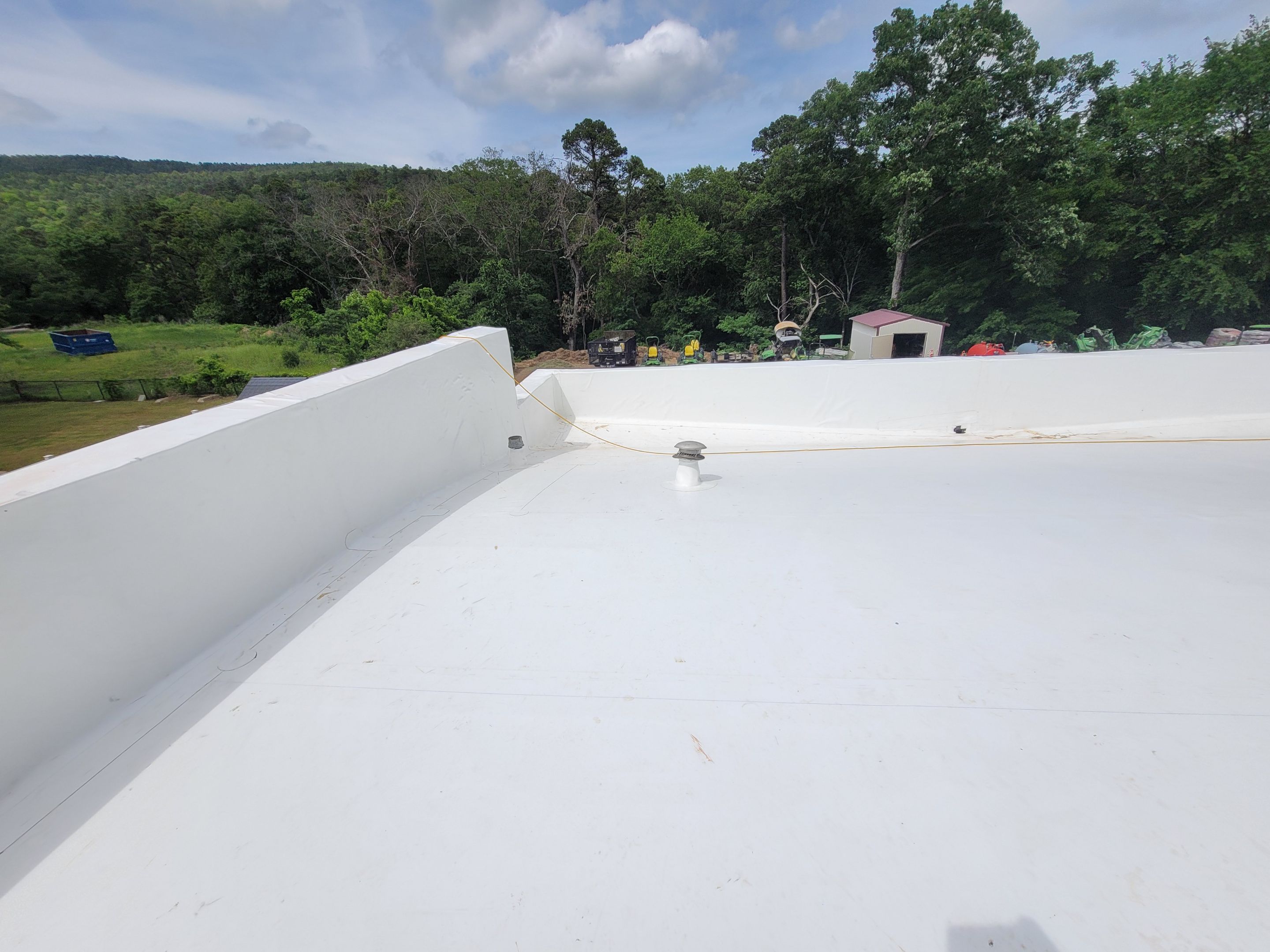 Choctaw Nation Healthcare Center - White Building by Hostetler Roofing
