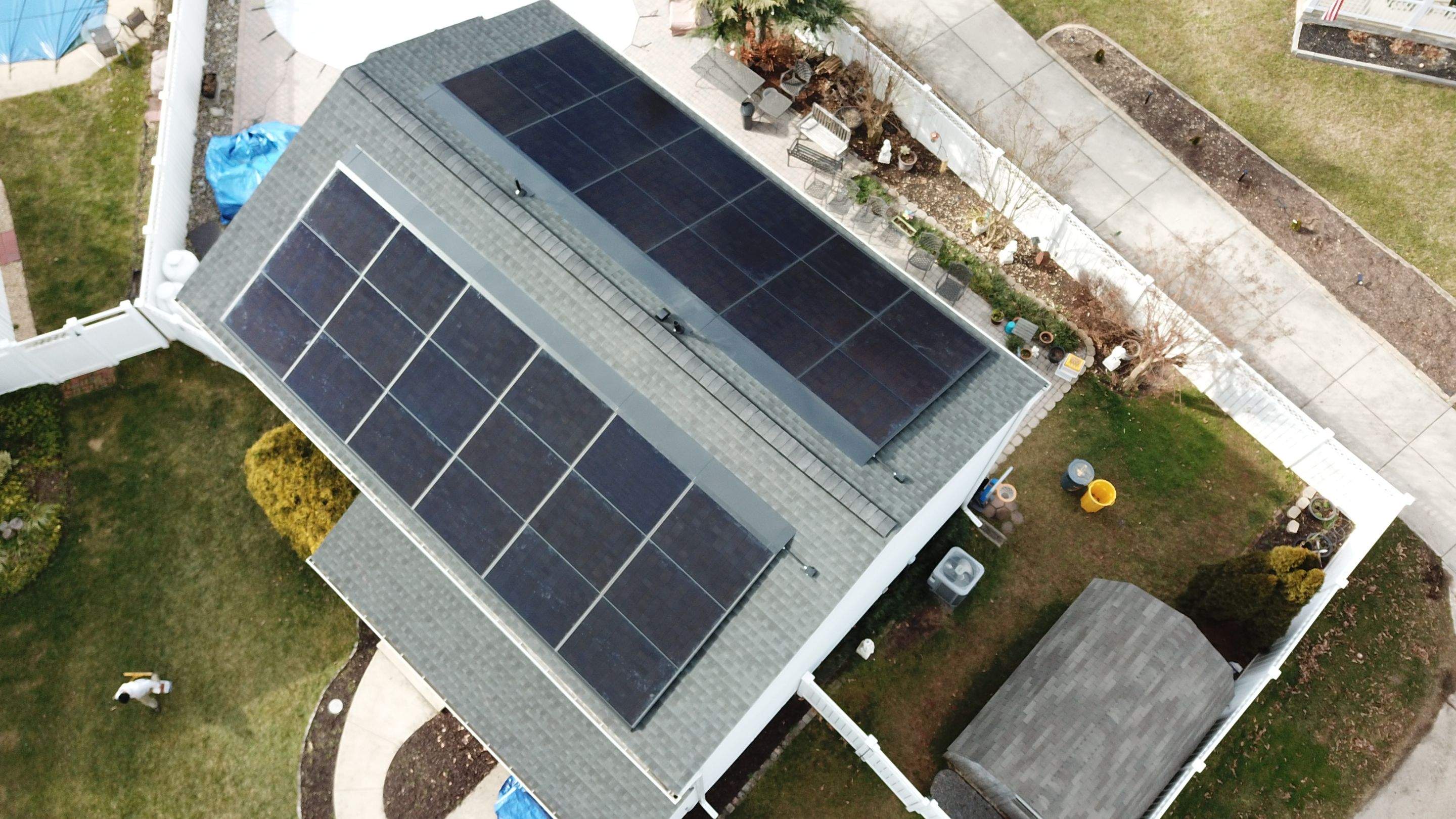 Roof Replacement with GAF Decotech integrated solar panels by American Home Contractors