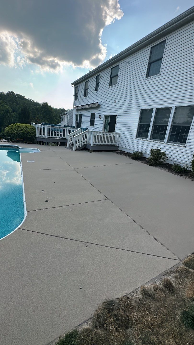 Pool Deck + Driveway + Garage Project in Venetia by Floors in a Day, Inc