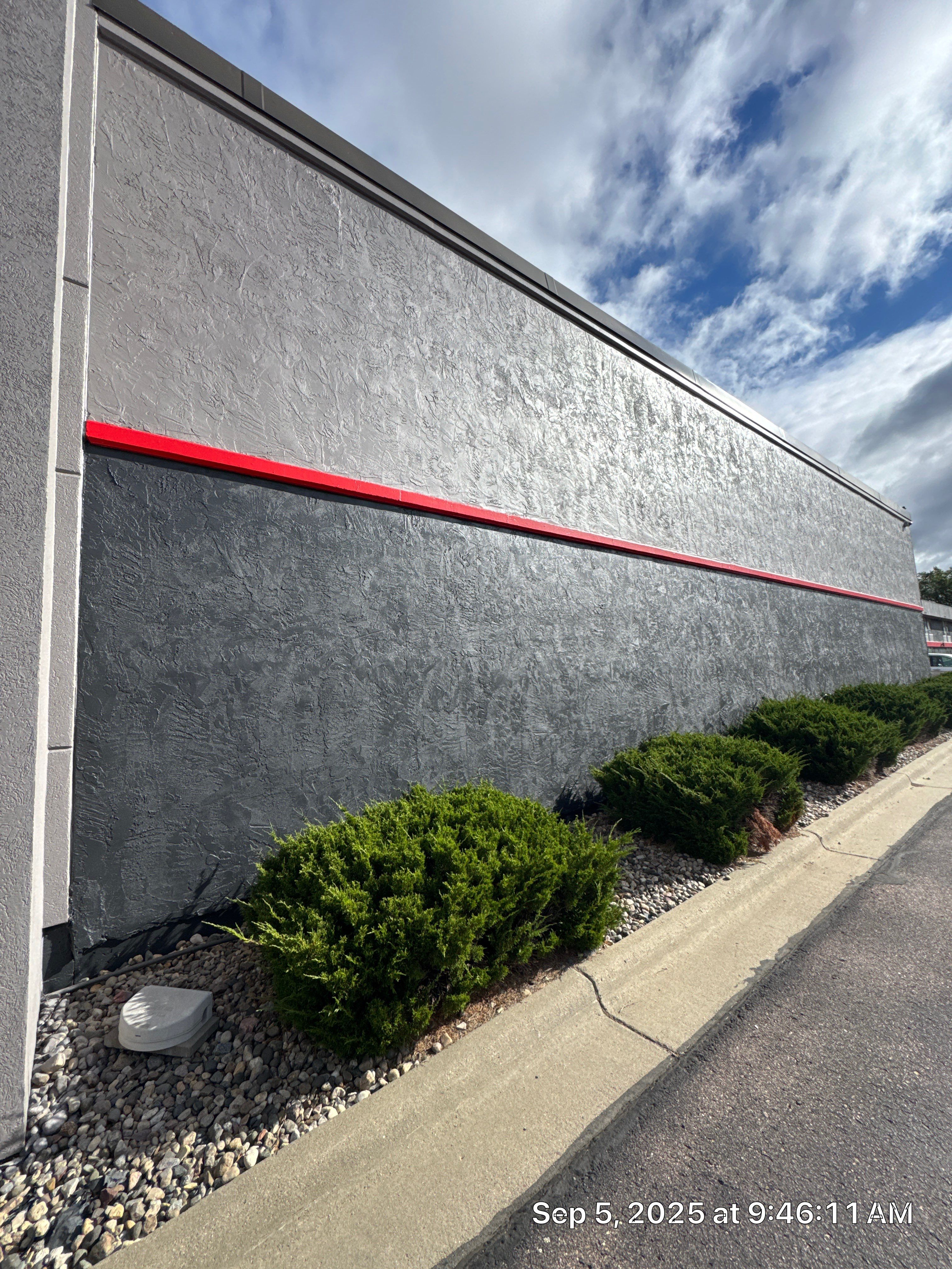 Commercial Exterior Painting with Stucco and Bold Red Accent Trim by Select Painting, Coatings & Garage Cabinets