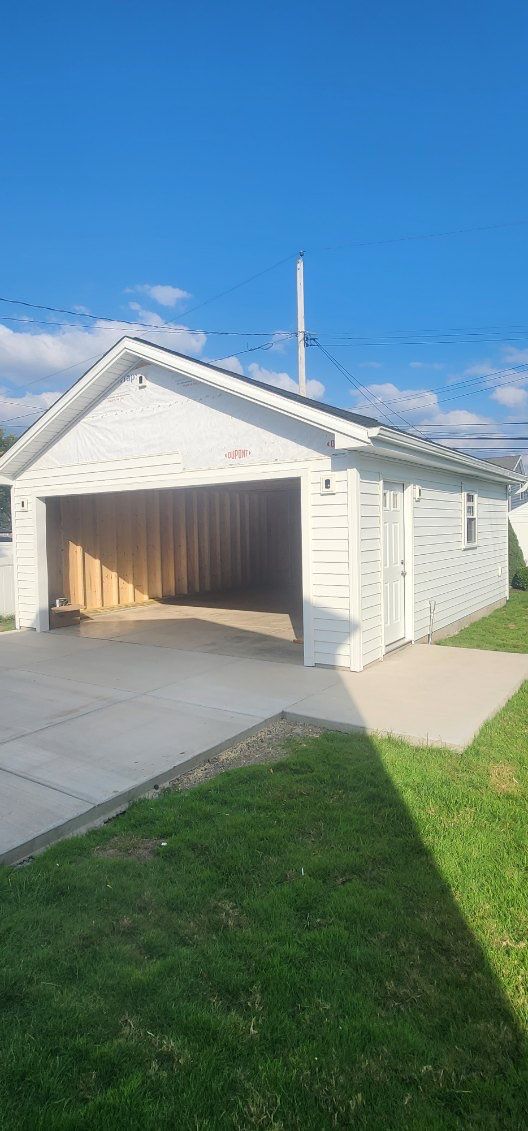 Garage And Concrete by Ivy Lea Construction