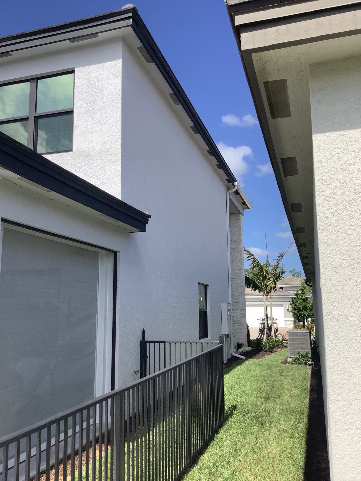 Splash Guard Gutters for Estero FL Rooflines by Gutter Professors