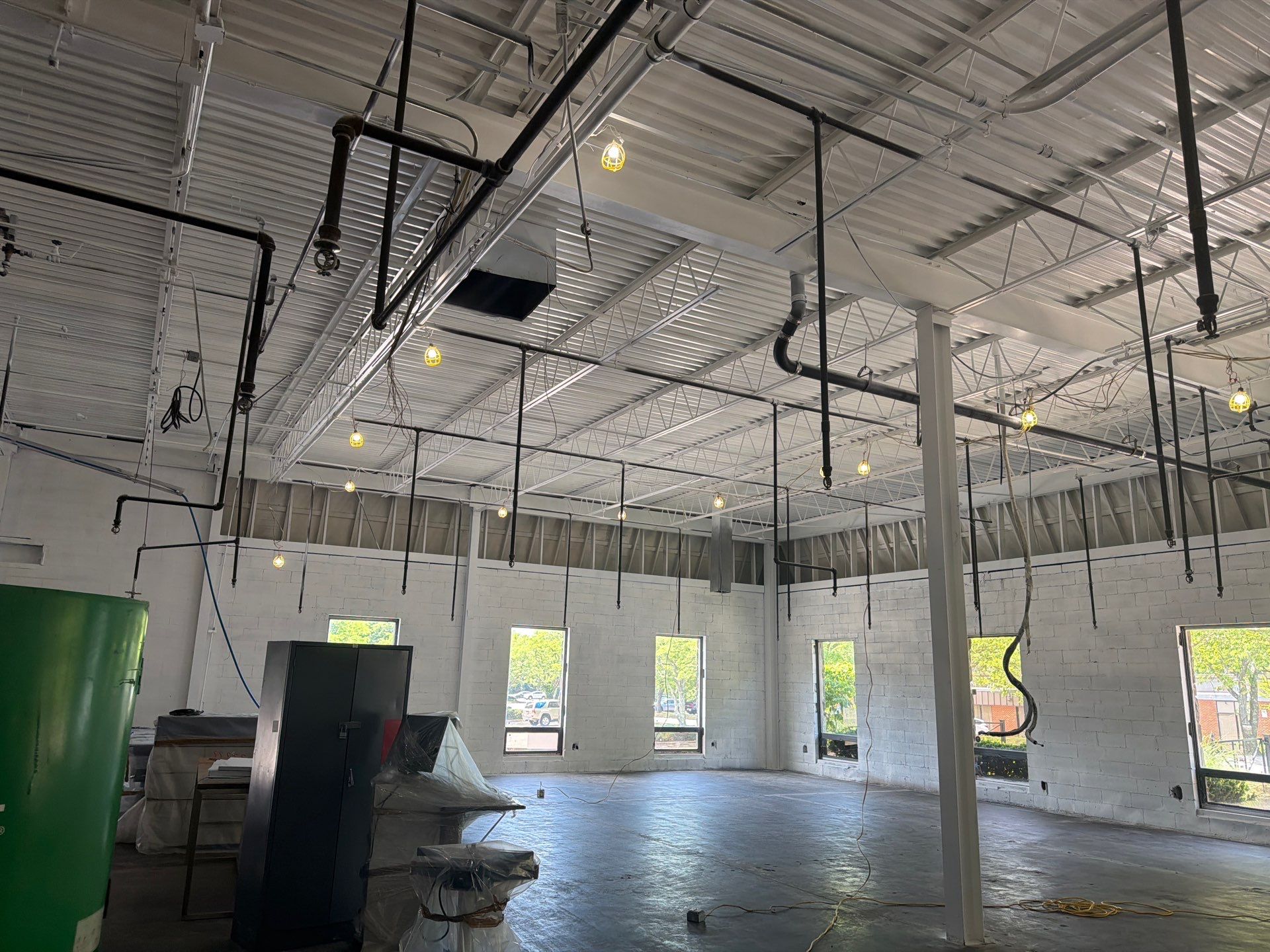 Industrial Warehouse Fire Damage Cleaning and Spray Sealing in Islandia by EMS Restoration Corp