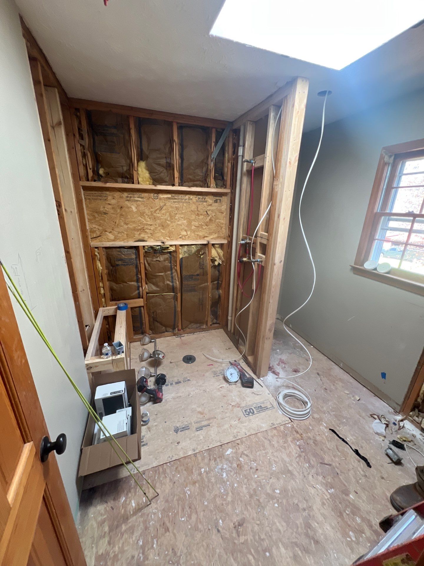 Modern Bathroom Remodeling Featuring Marble Tiles and Custom Cabinetry in Smyrna by Swift Home Renovations
