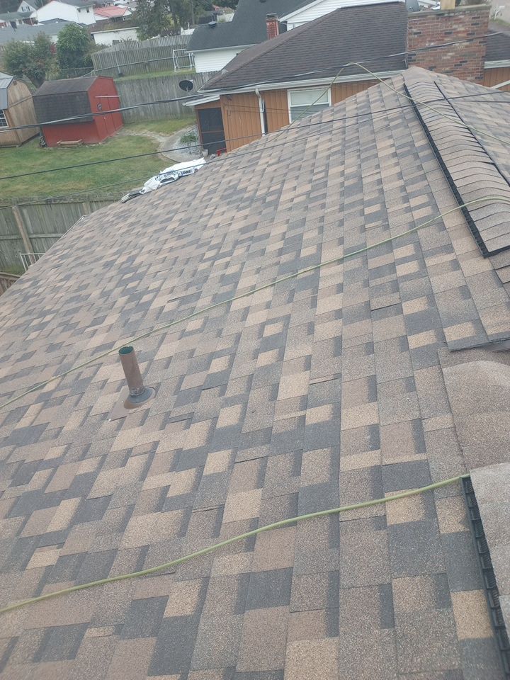 Residential Roofing Installation using Performance Shingles by Mr. Roofer