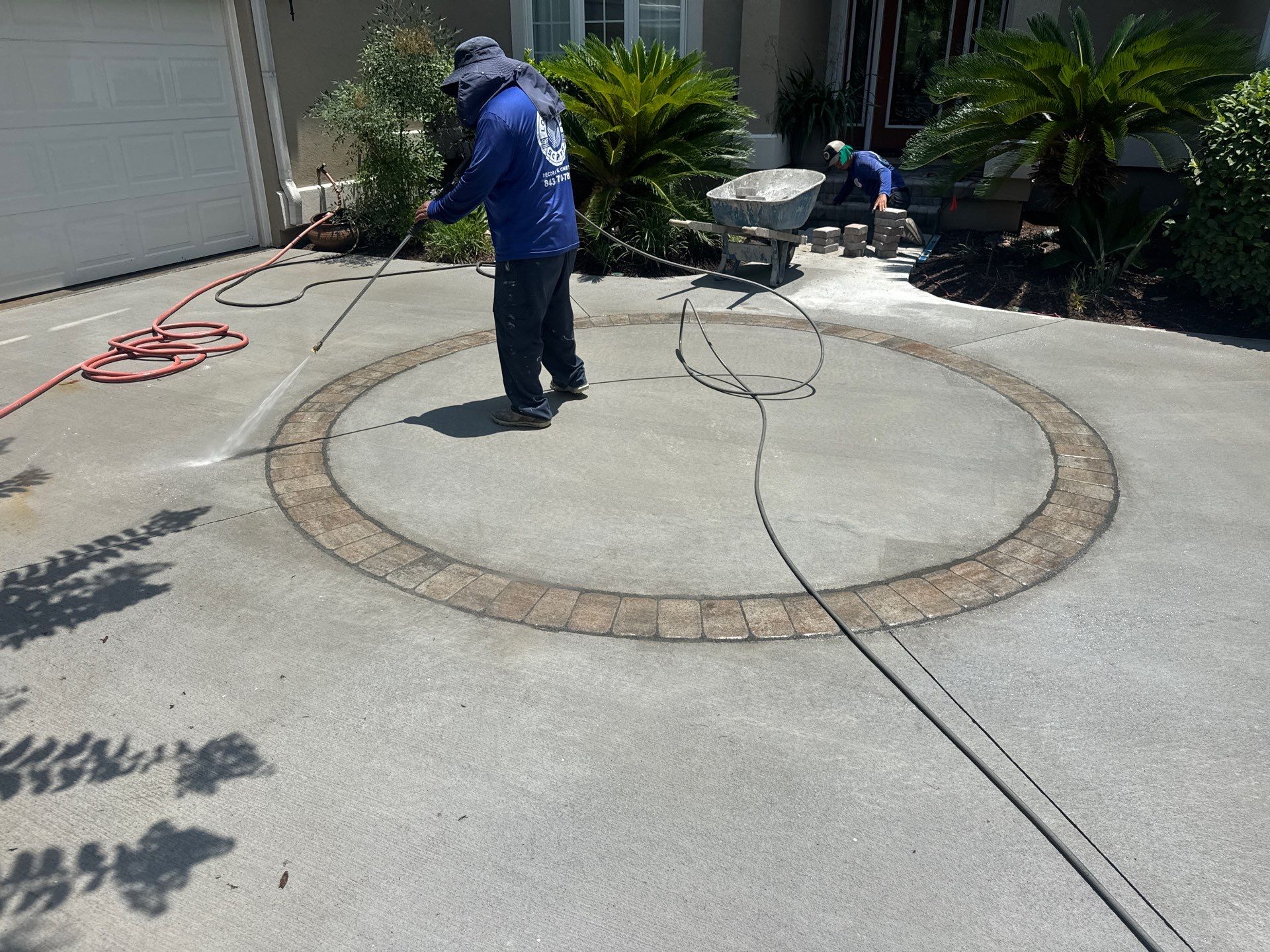 Custom Concrete Driveway and Decorative Paver Installation in Bluffton by Lowcountry Scapes, LLC
