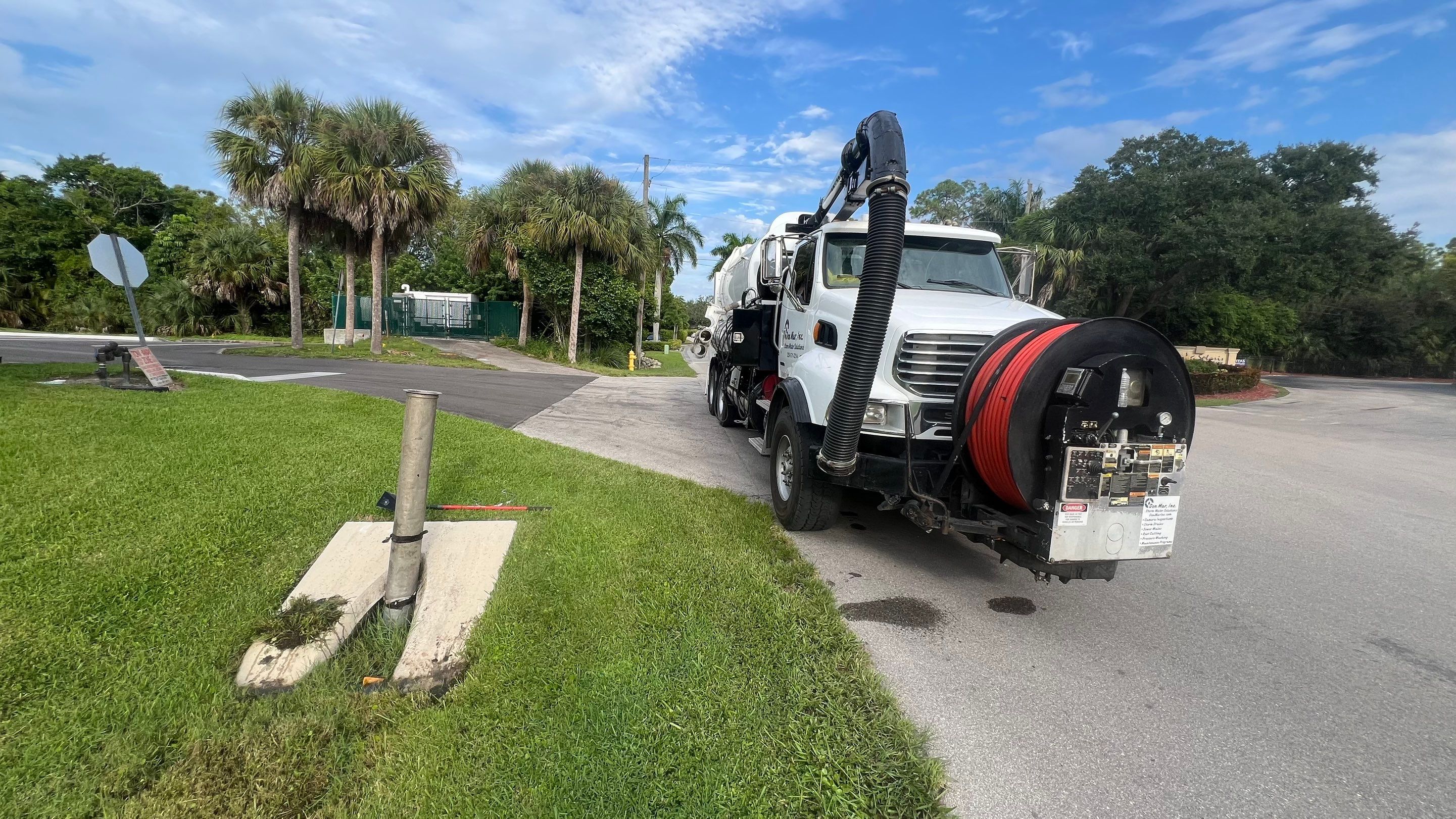 Naples Community Entry Road Stormwater System Cleaning by APS Power & Water