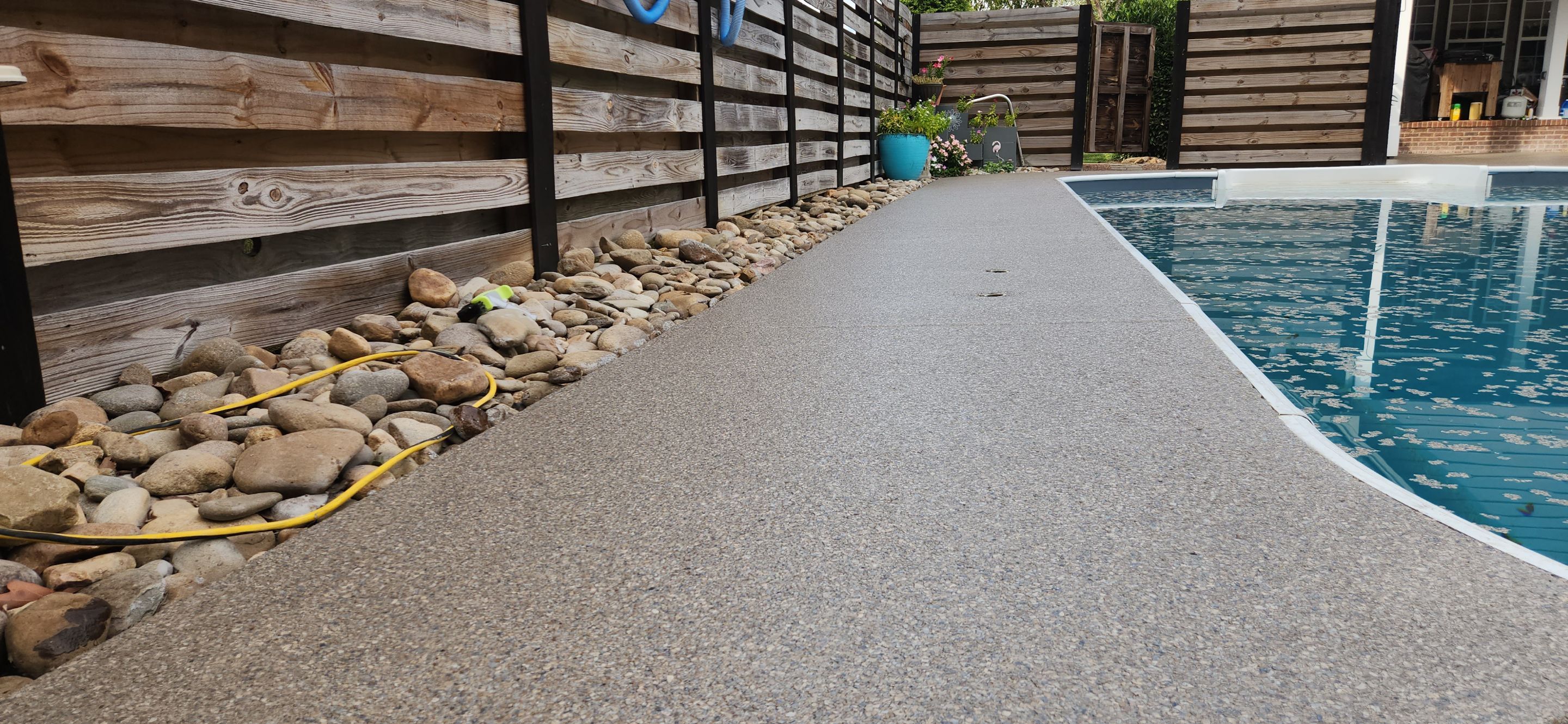 Pool Deck  using Obsidian by Elite Floor Solutions