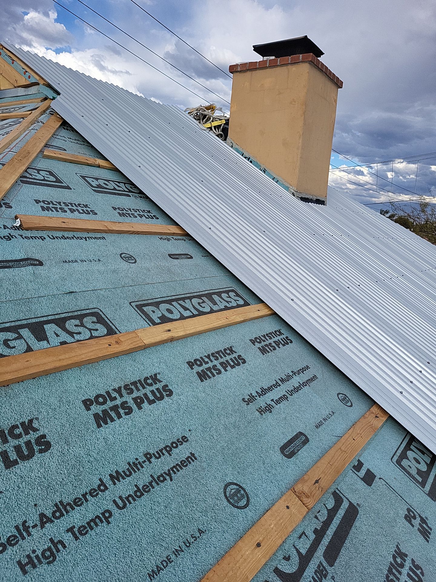 Metallic Silver Exposed Fastener by Reimagine Roofing