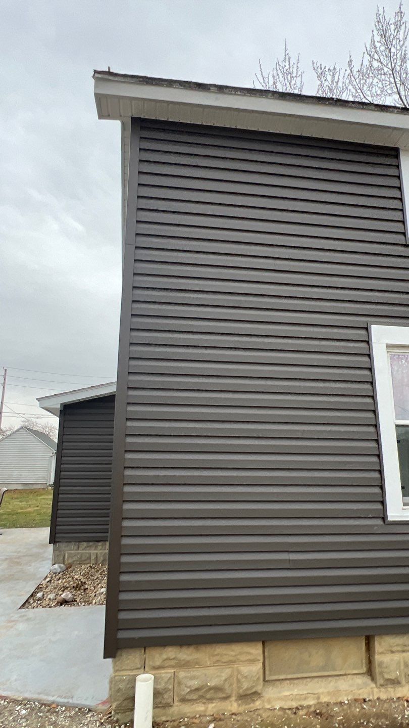 Residential fascia replacement using Exterior Portfolio 4.5 DL - Peppercorn by Nitro Roofing and Construction