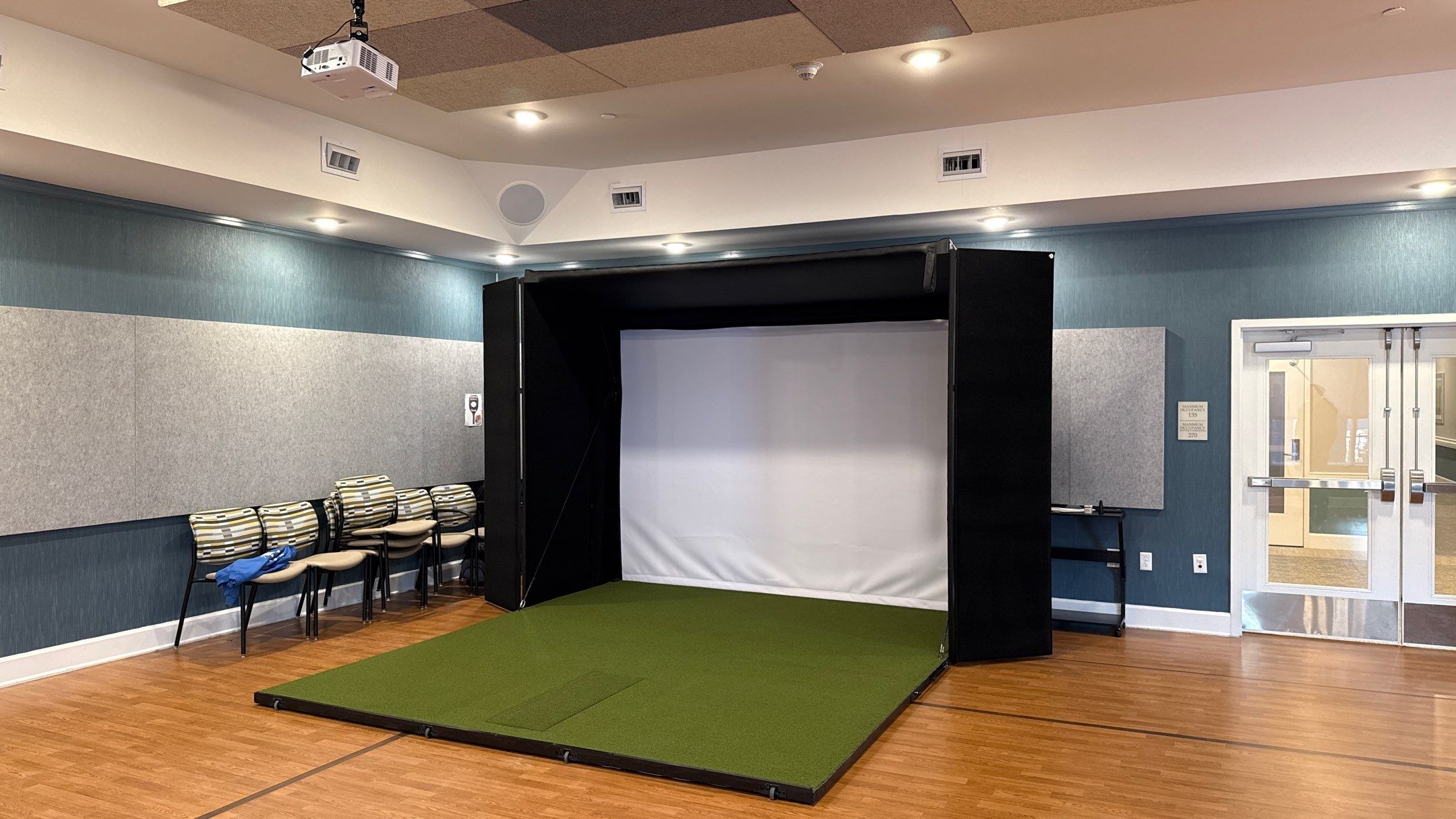 A Beautiful Murphy Golf Simulator  by Banner Garage