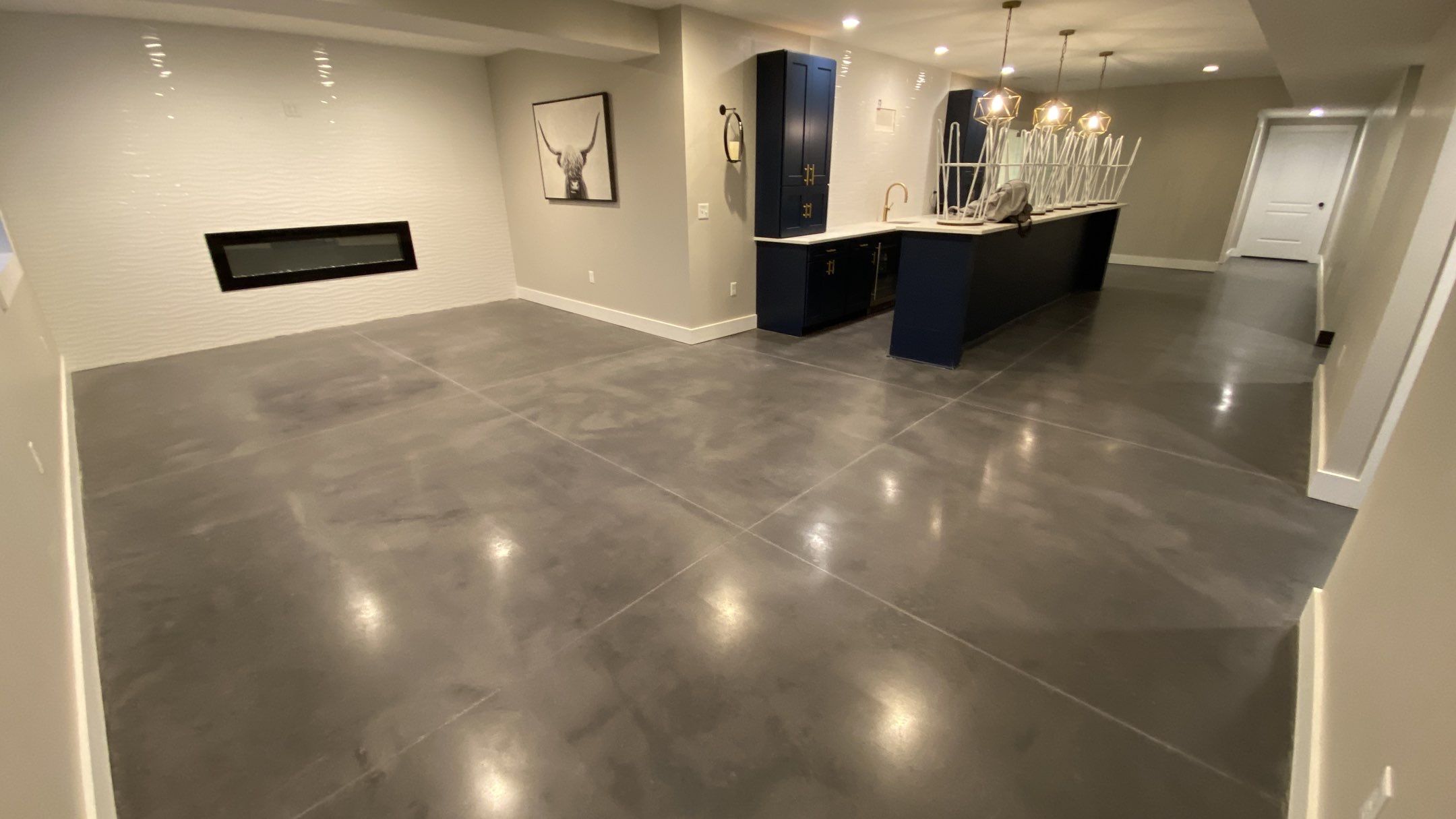 Louisburg, KS -- Basement Polish using Grey Stain by Big Red Decorative Concrete, LLC