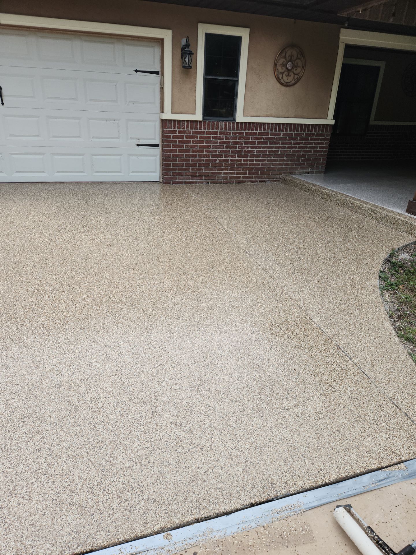 Driveway & Patio Recoating using Polyaspartic by Revelry Coatings