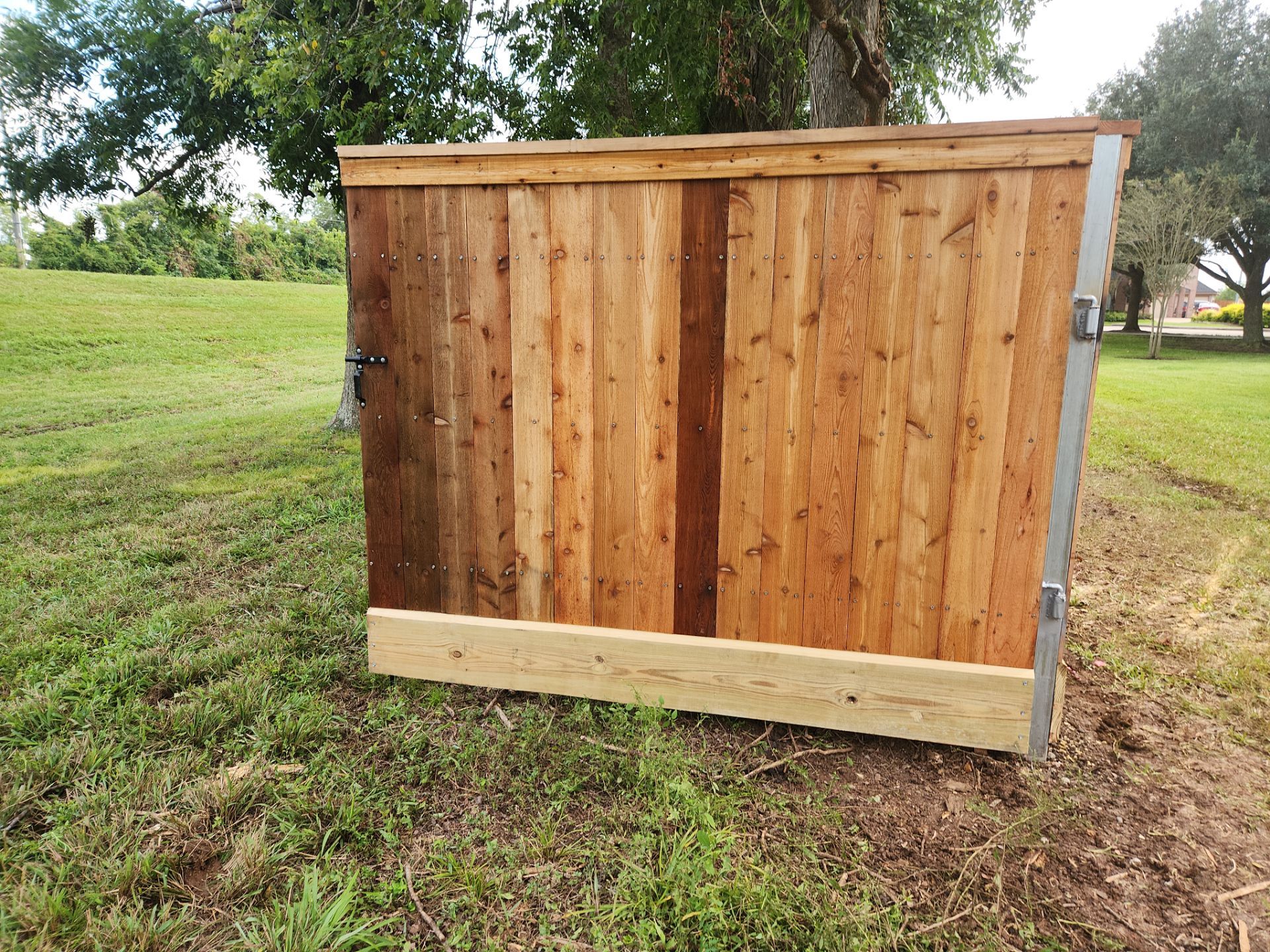Wood Fence Installation for HOA by Tim's Fences