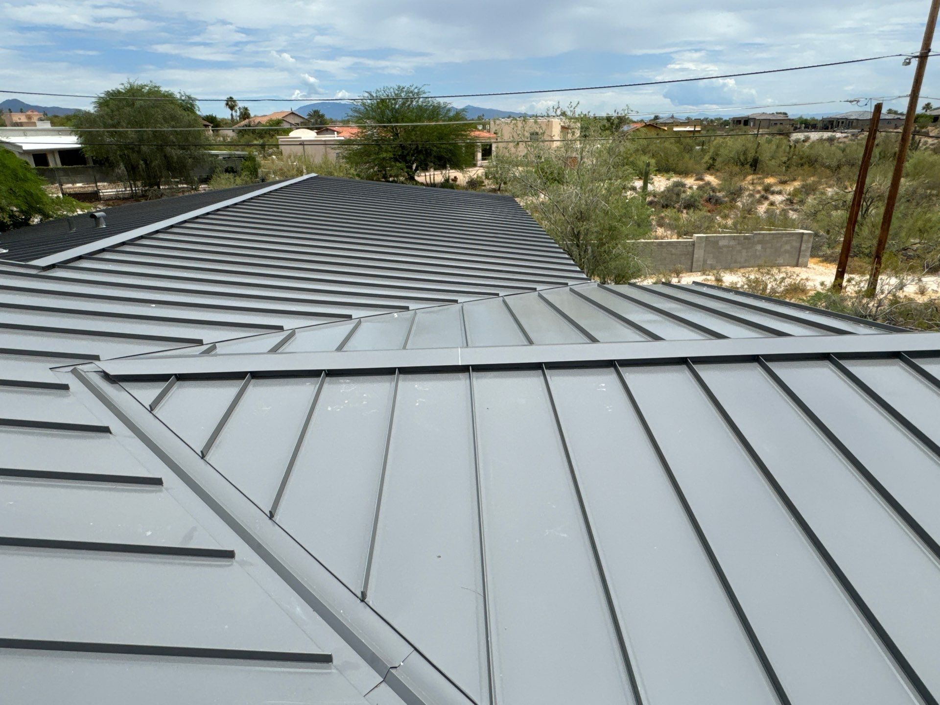 Charcoal Gray Standing Seam by Reimagine Roofing