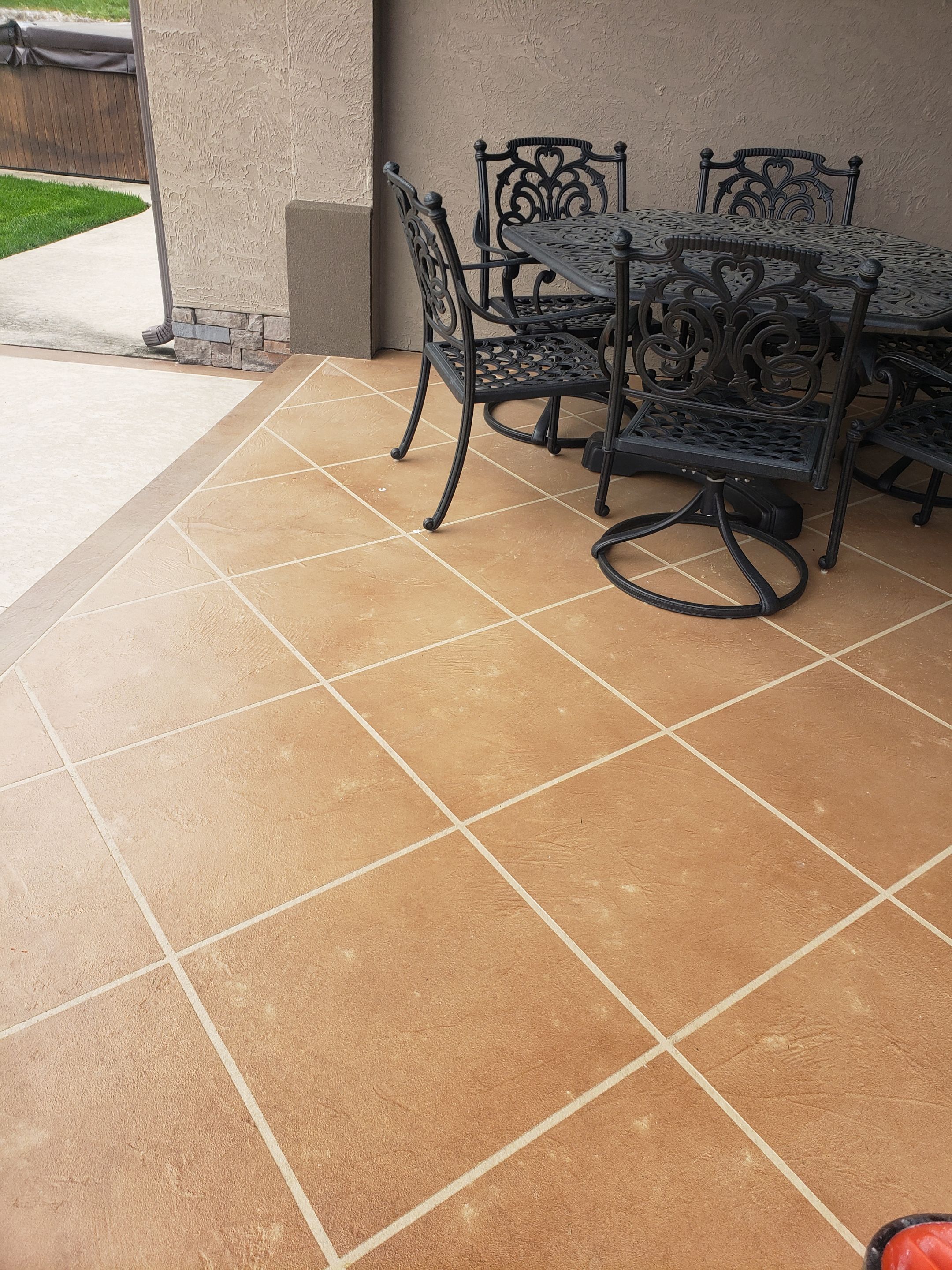 Lake Lotawana -- Front Walkway and Back Patio Tuscan Overlay by Big Red Decorative Concrete, LLC