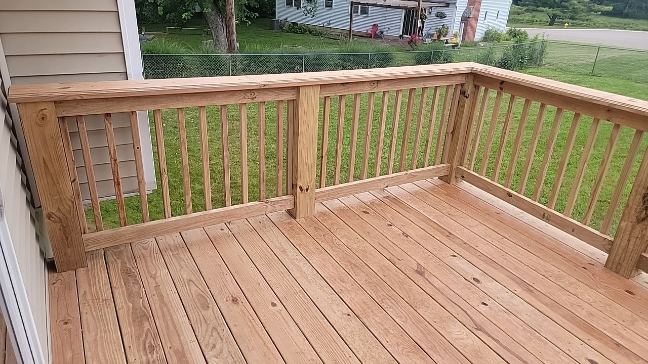 Deck Installation using Treated Lumber by Avalon Roofing and Exteriors