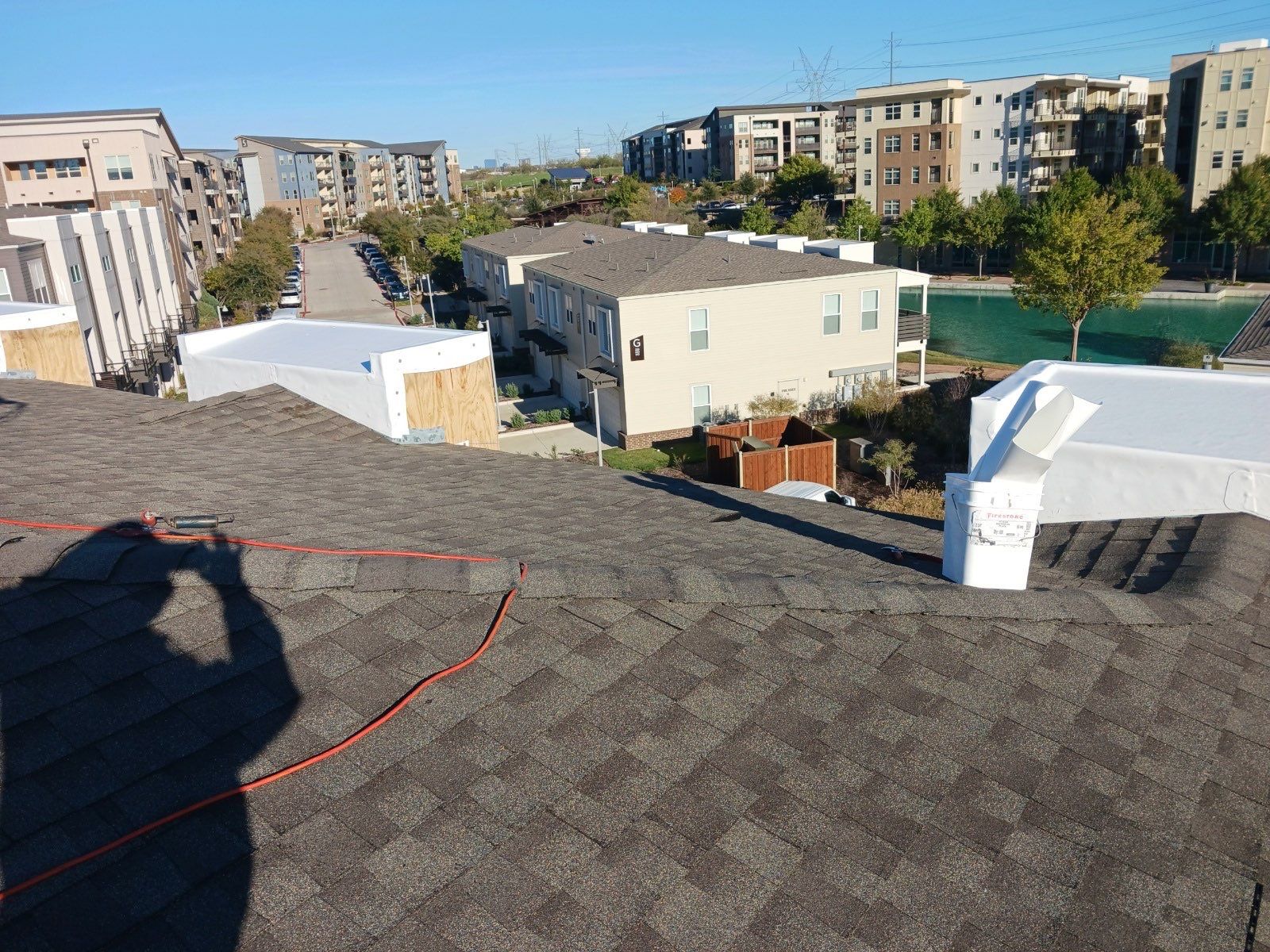 Apartment Roofing Installation using GAF HDZ Shingles, GAF TPO and Pavers in Lewisville, TX by Roof Experts