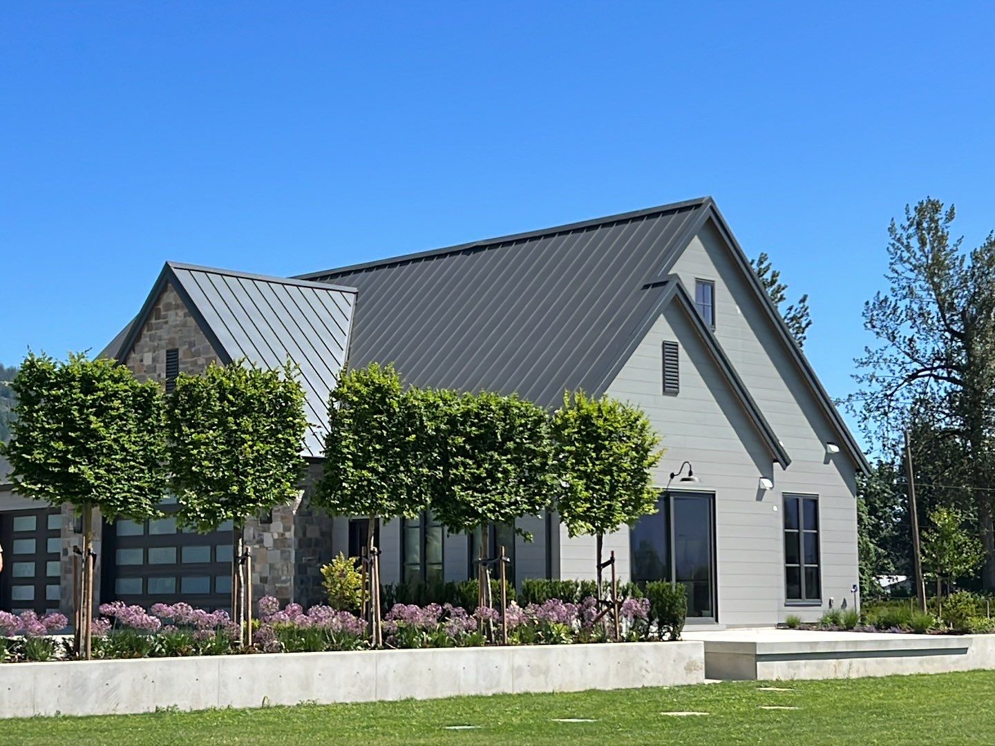 Residential Roofing Installation using 12" Prolok metal  by Top Notch Roofing Inc