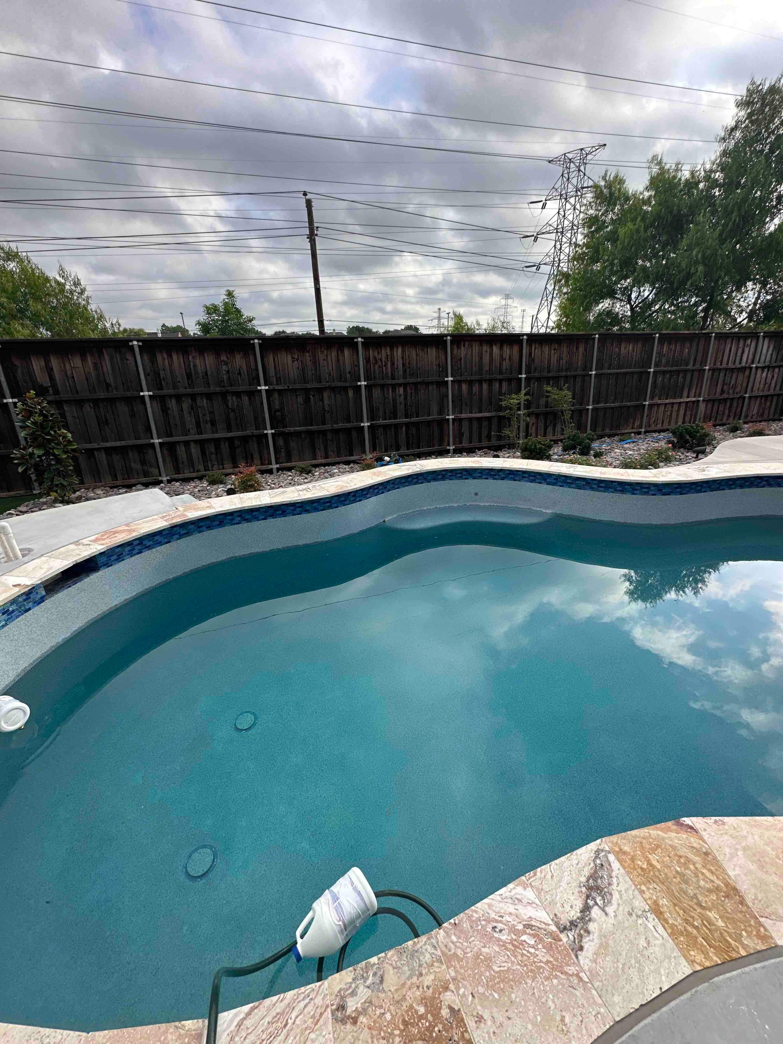 Freeform Pool and Spa with Pergola and Outdoor Kitchen by Pinnacle Pools and Spas - DFW