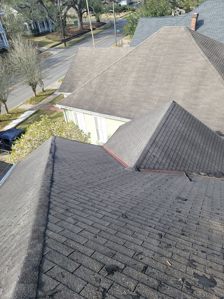 Residential Roofing Installation using Roof Replacement by American Roofing & Construction LLC