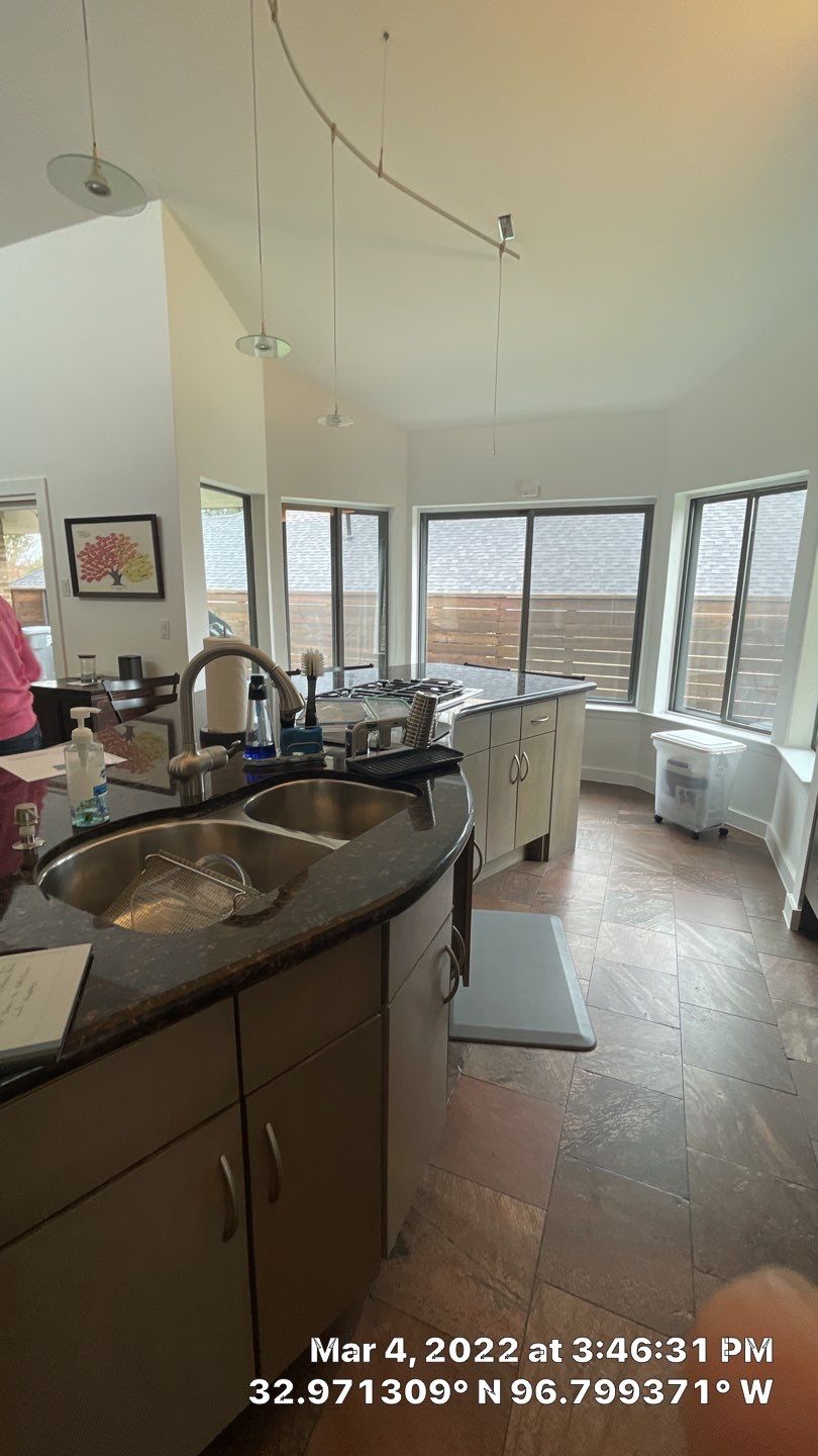 Modern & Clean Kitchen by SLM General Contractors & Roofing