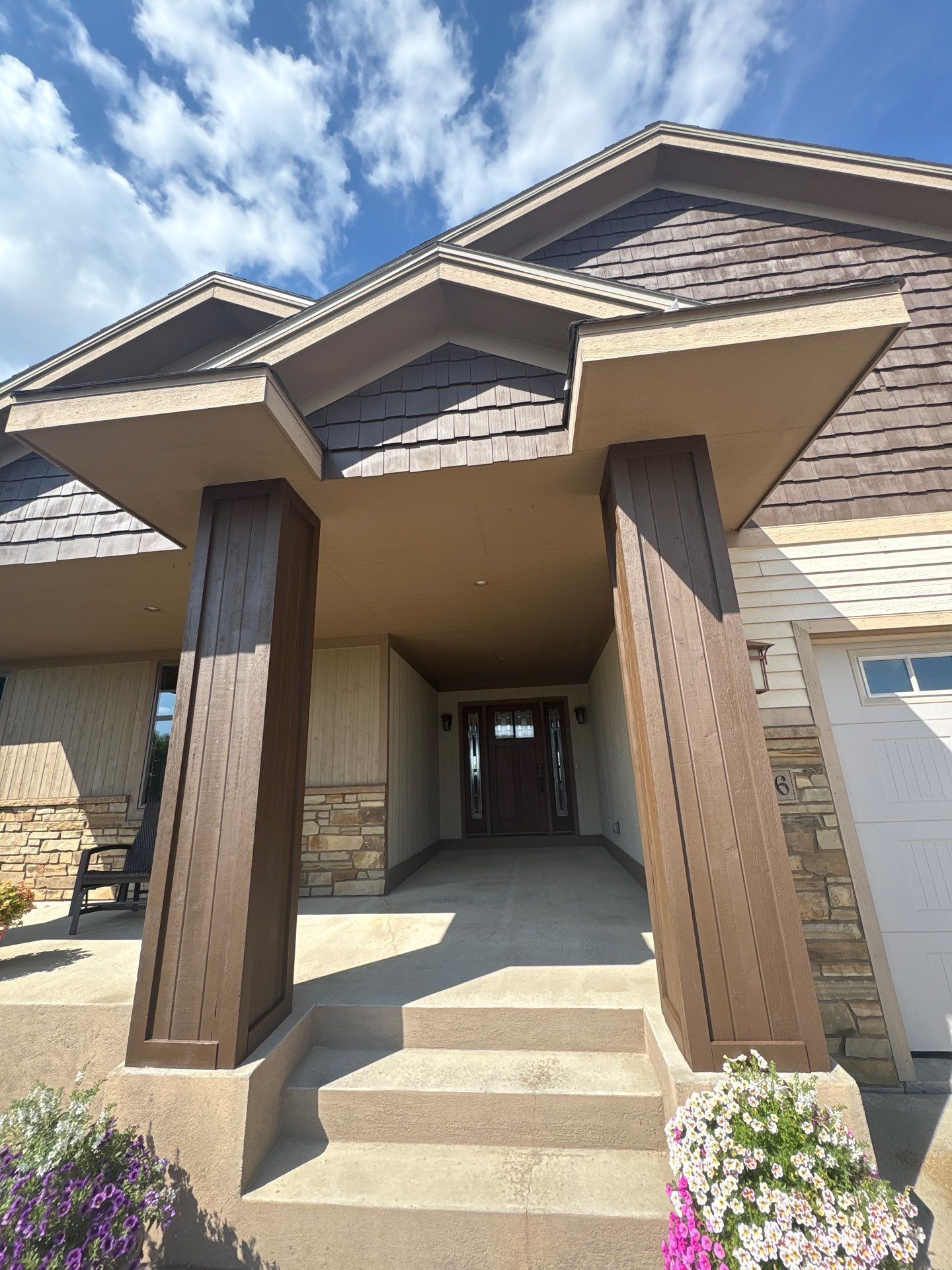 Sioux Falls Exterior Refresh and Multi-Level Deck Maintenance by Select Painting, Coatings & Garage Cabinets