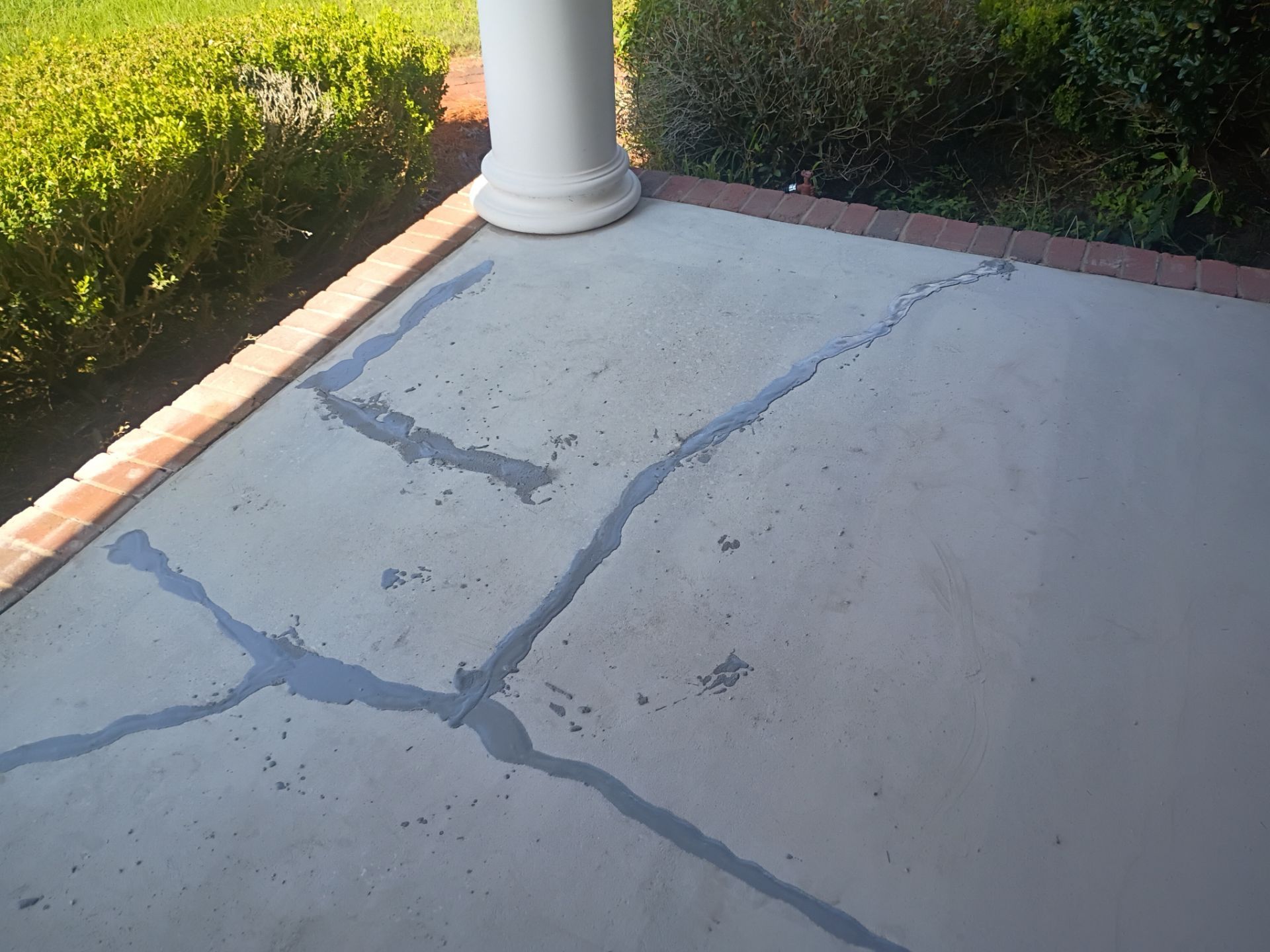 Front Porch in Pecan by Cross Creek Concrete Coatings