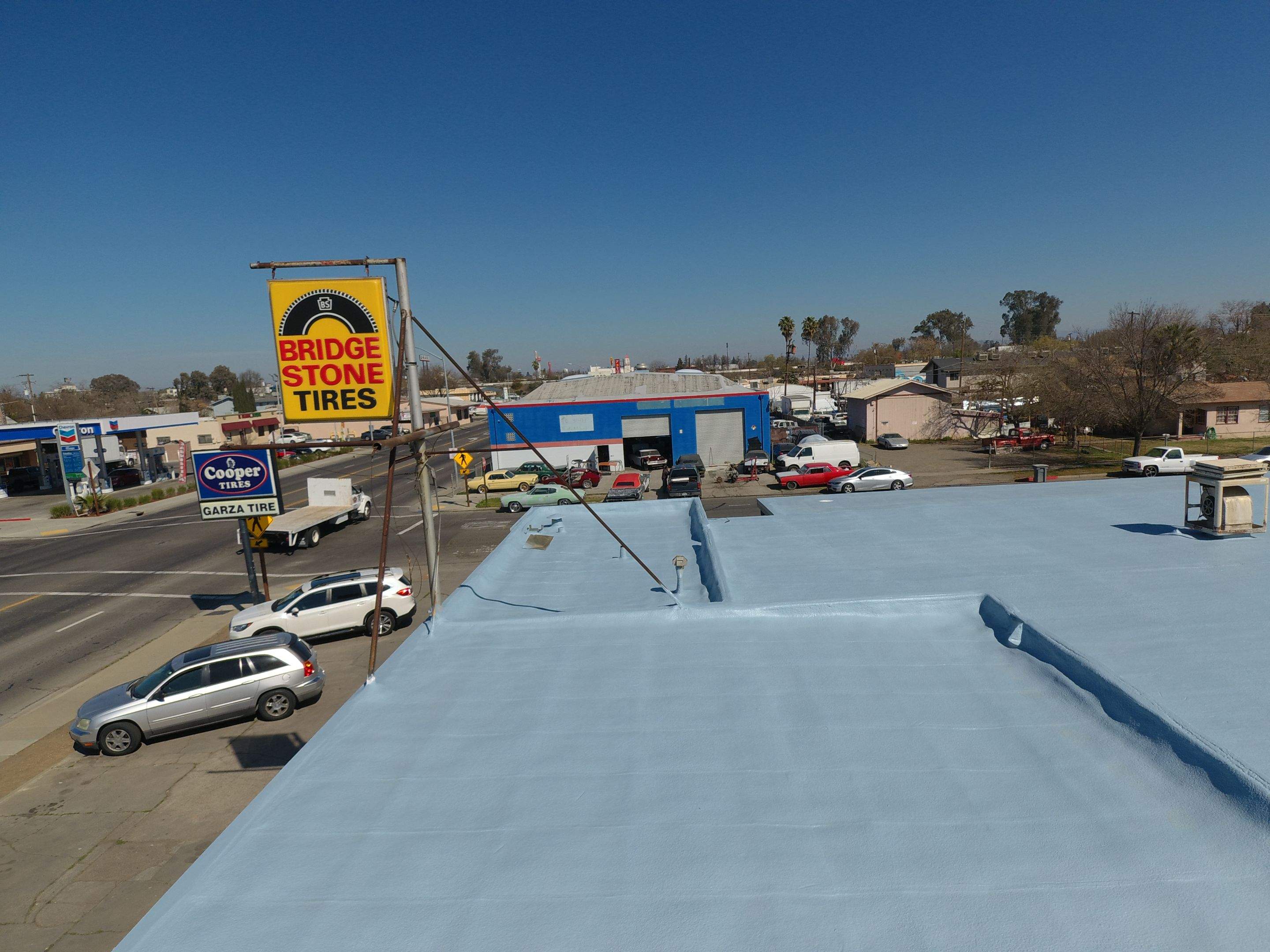 Spray foam and coatings using Conklin Benchmark/PUMA XL coatings and spray foam by Straight Edge Roofing Inc