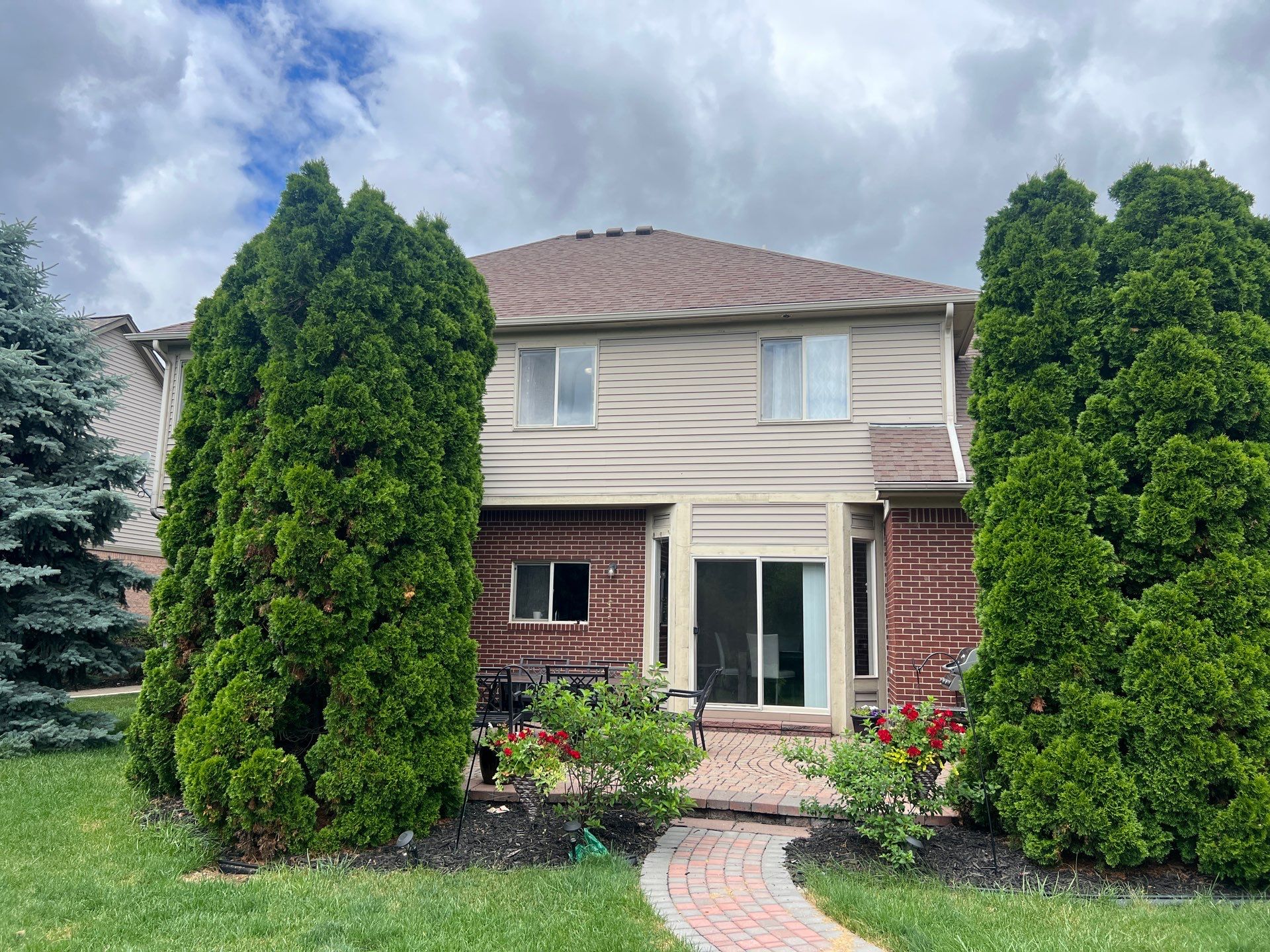 Vinyl Siding and Exterior Trim Painting in Commerce Township by Top Shelf Painter