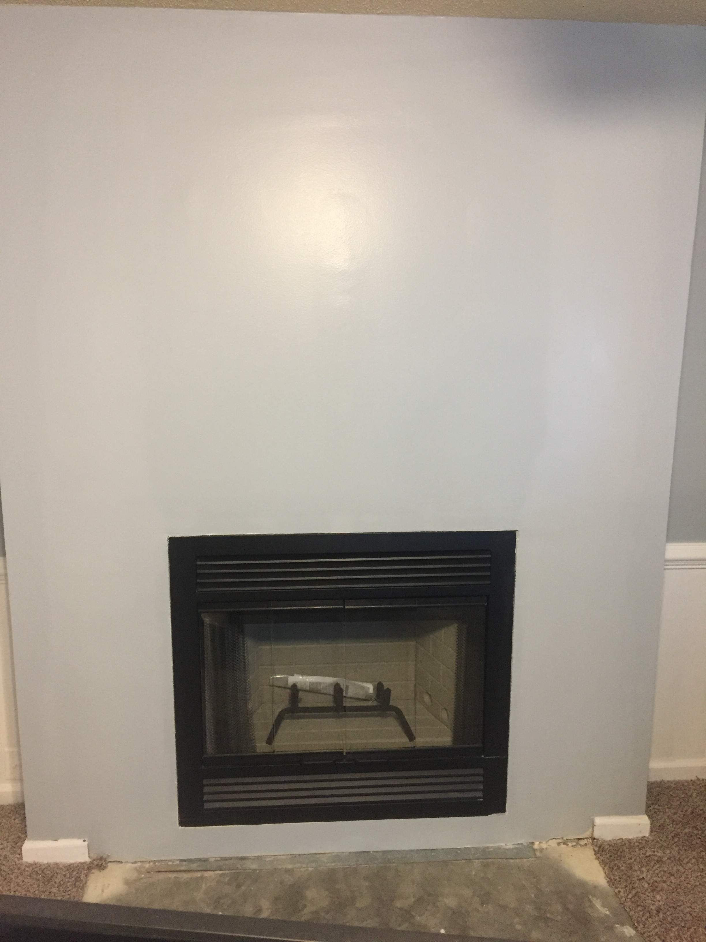 Wood Fireplace + stone + mantel by Premier Chimney and Roofing