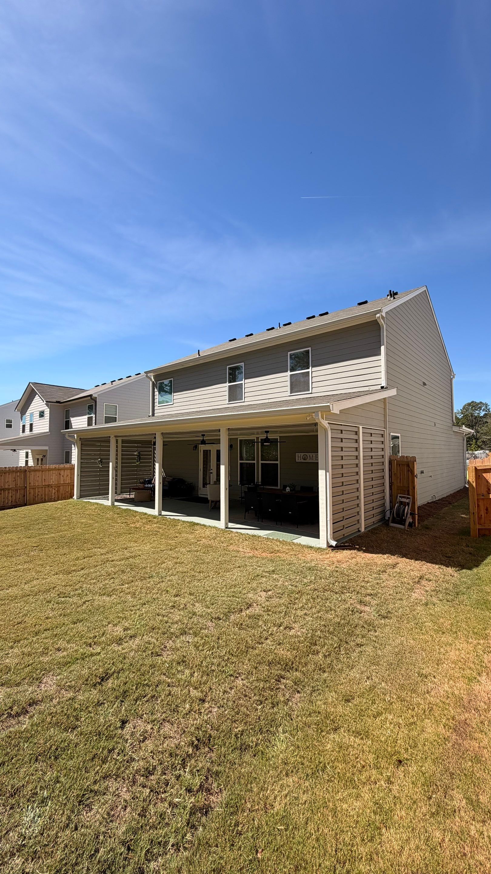 Custom Covered Back Porch with Privacy Screening in Acworth by Swift Home Renovations 