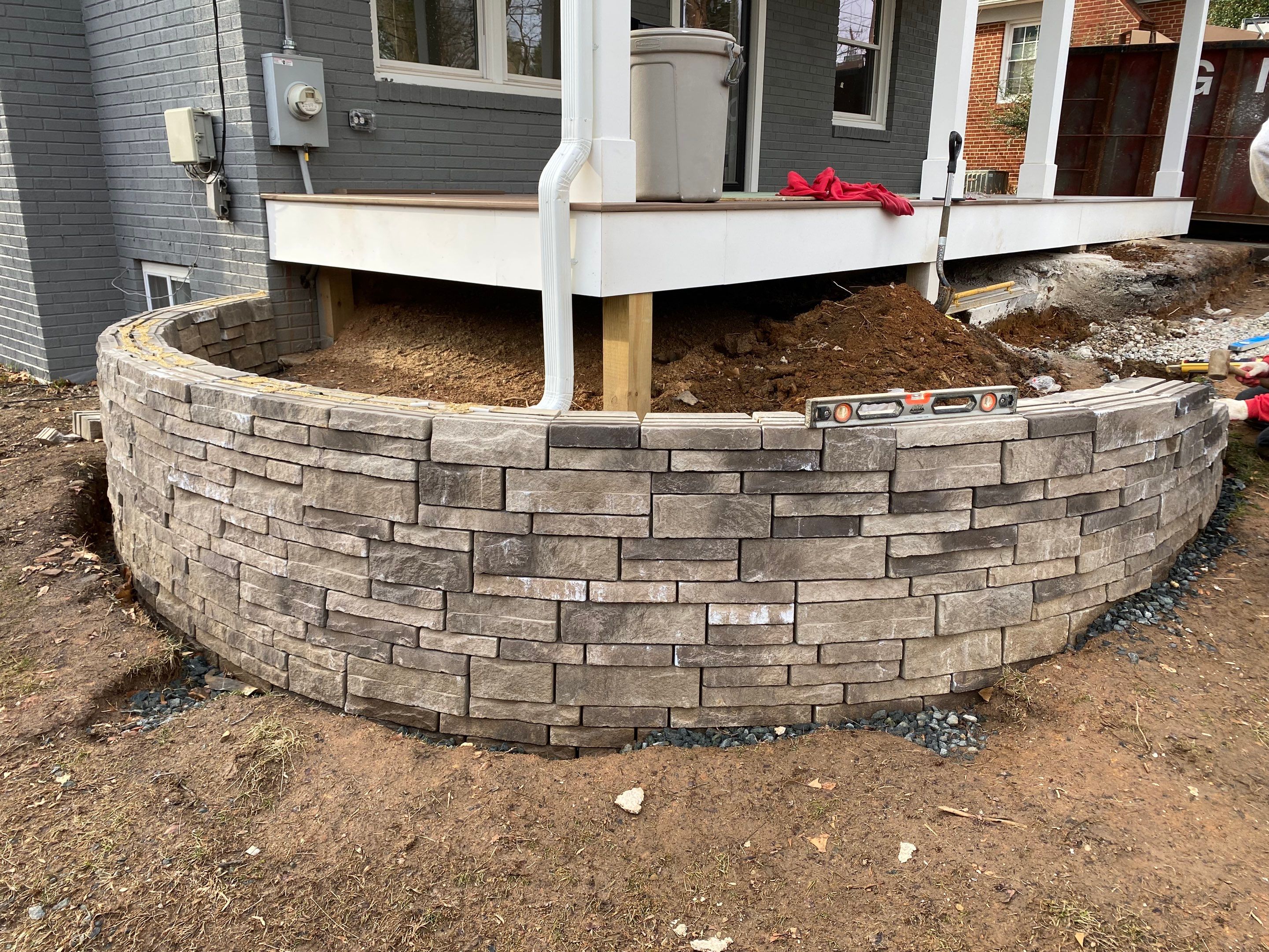 Retaining wall, walkway, small patio and landscape install by The Smet Companies, LLC