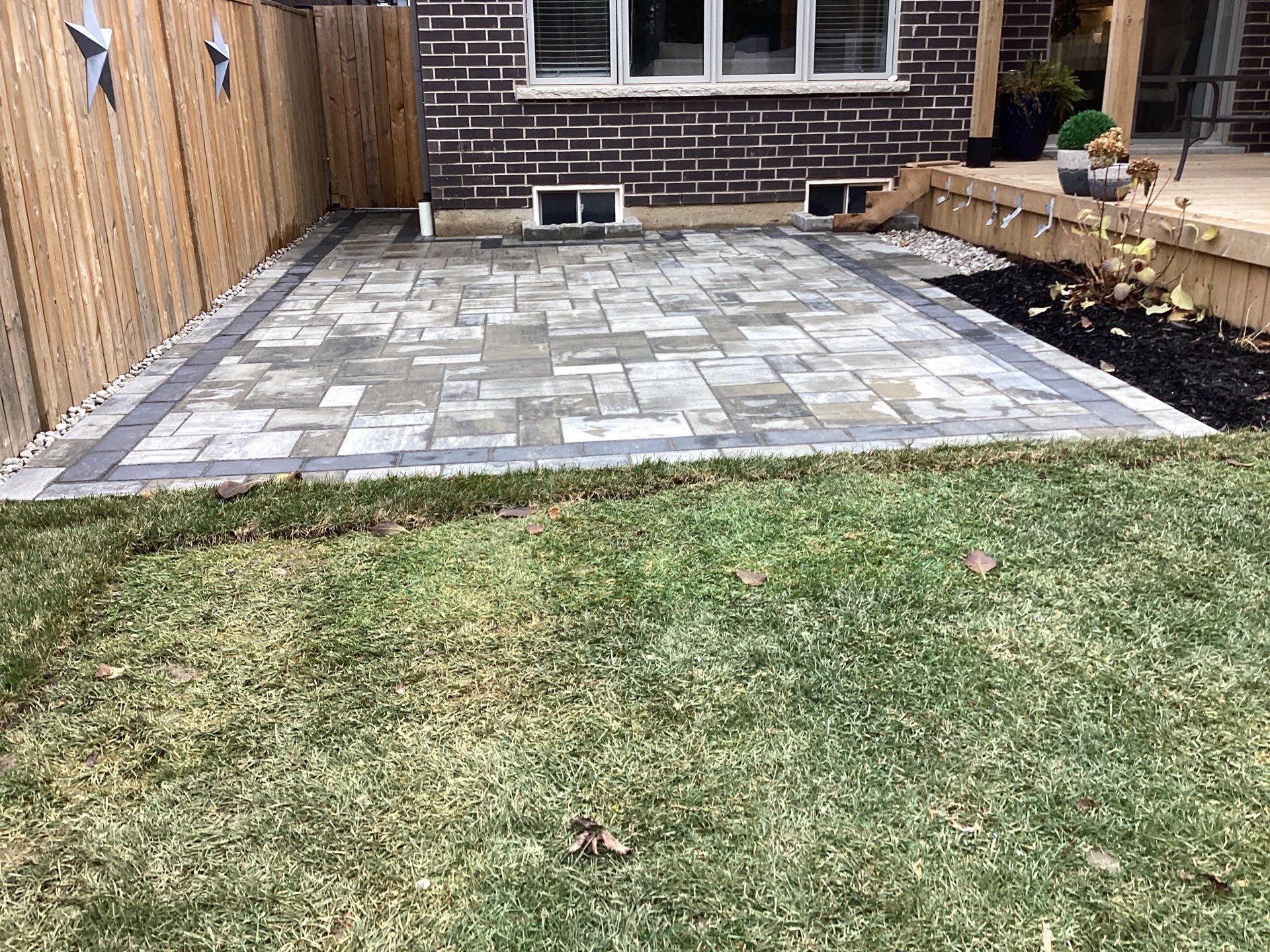 Front Entrance & Lounge Patio by Soares Landscaping