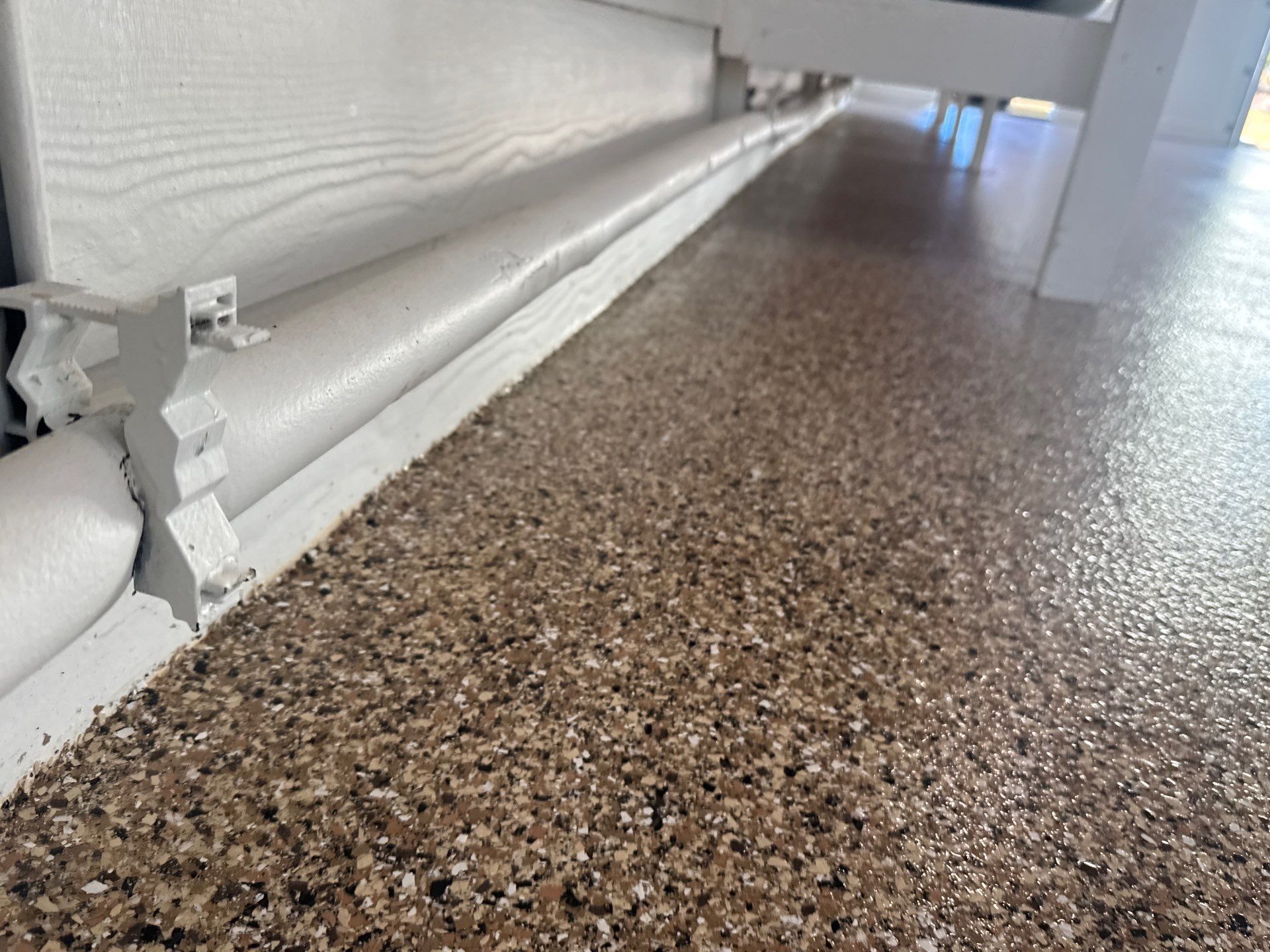 Garage in Hawthorne, FL in Sandstone by Cross Creek Concrete Coatings