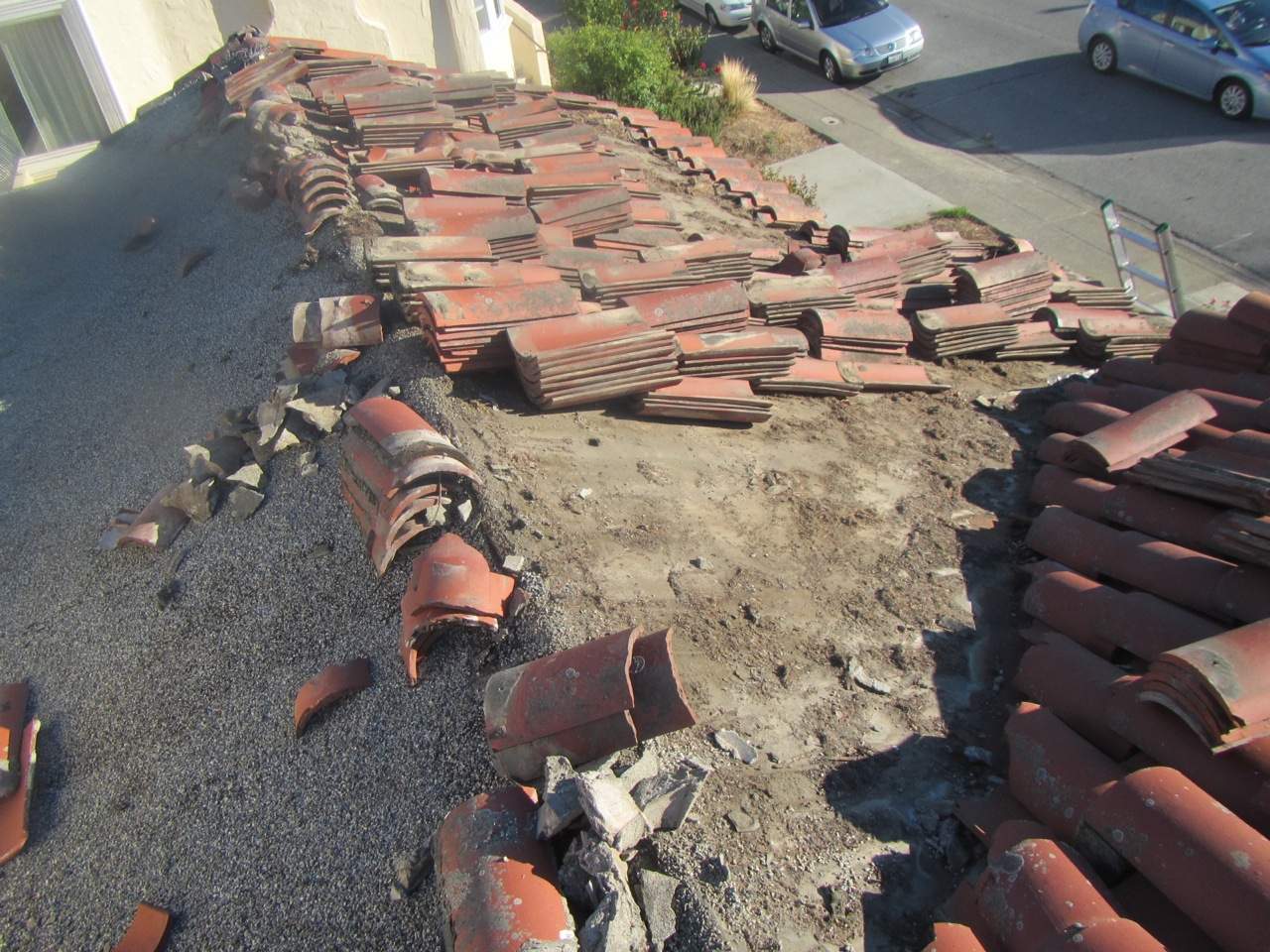Millbrae Residential Reroof with Terracotta Clay Tiles and Synthetic Underlayment by Eastman Roofing & Waterproofing Inc.