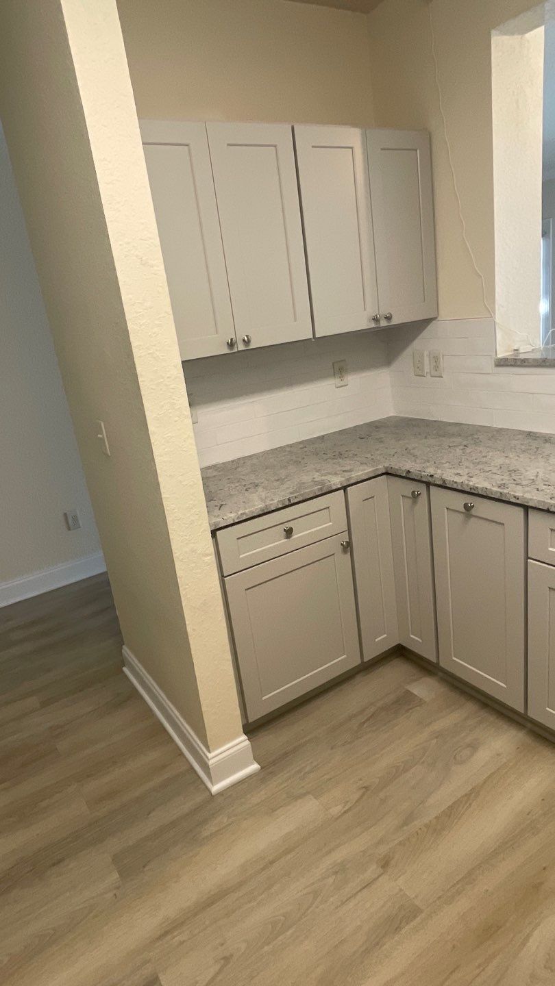 Home Remodel using LVP Flooring and Cabinets by HandyMangum