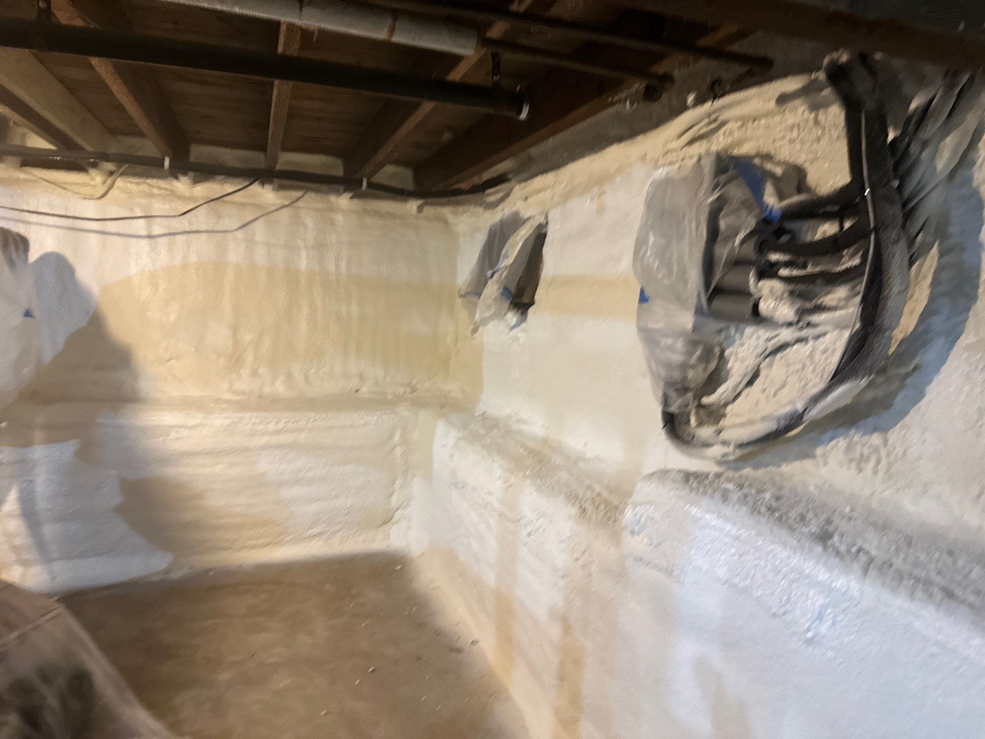 Basement Exterior Walls using Closed Cell Spray Foam by NYS Foam & Energy
