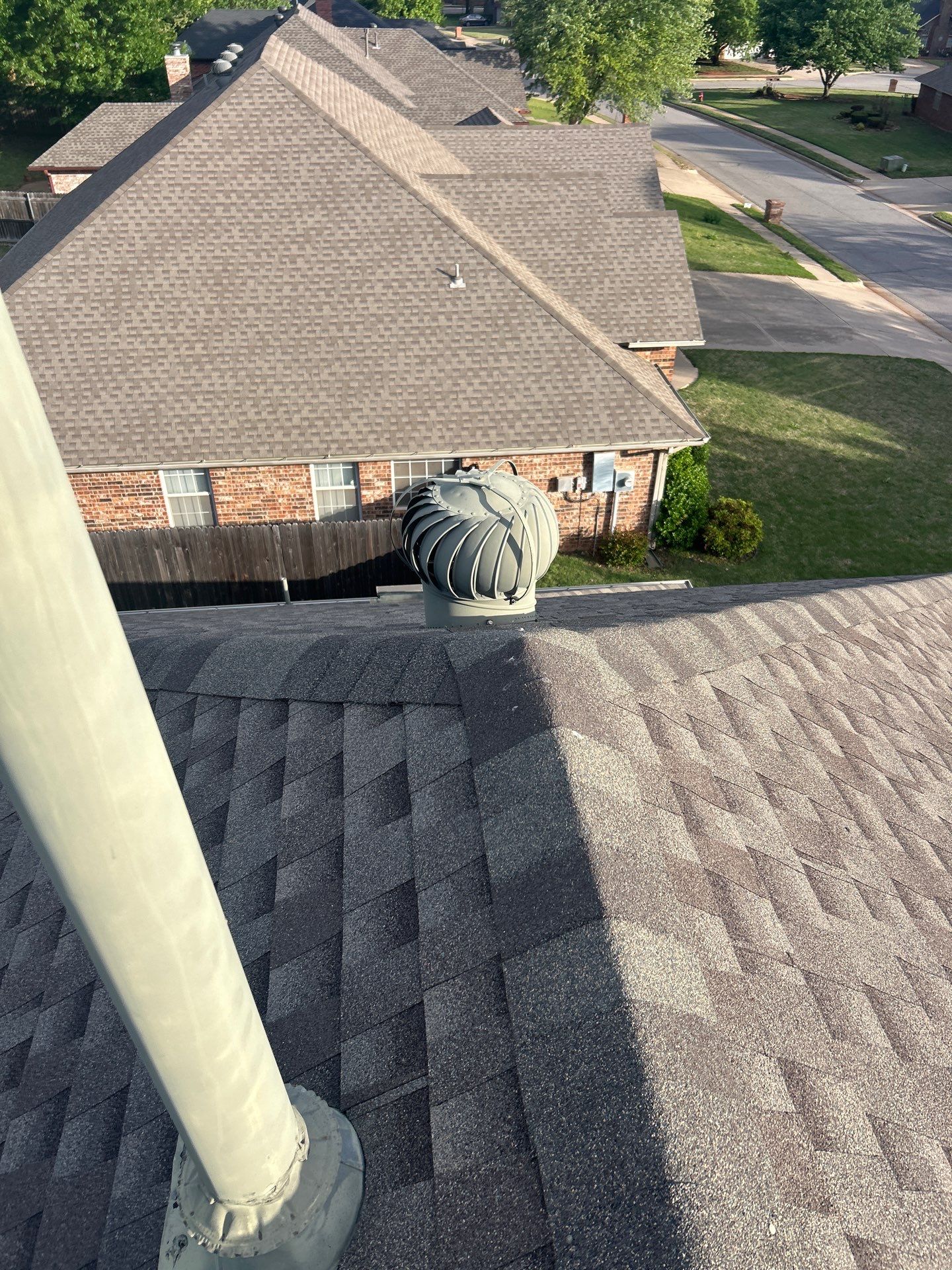 wind turbine replacement in Edmond by McCann's Roofing and Construction