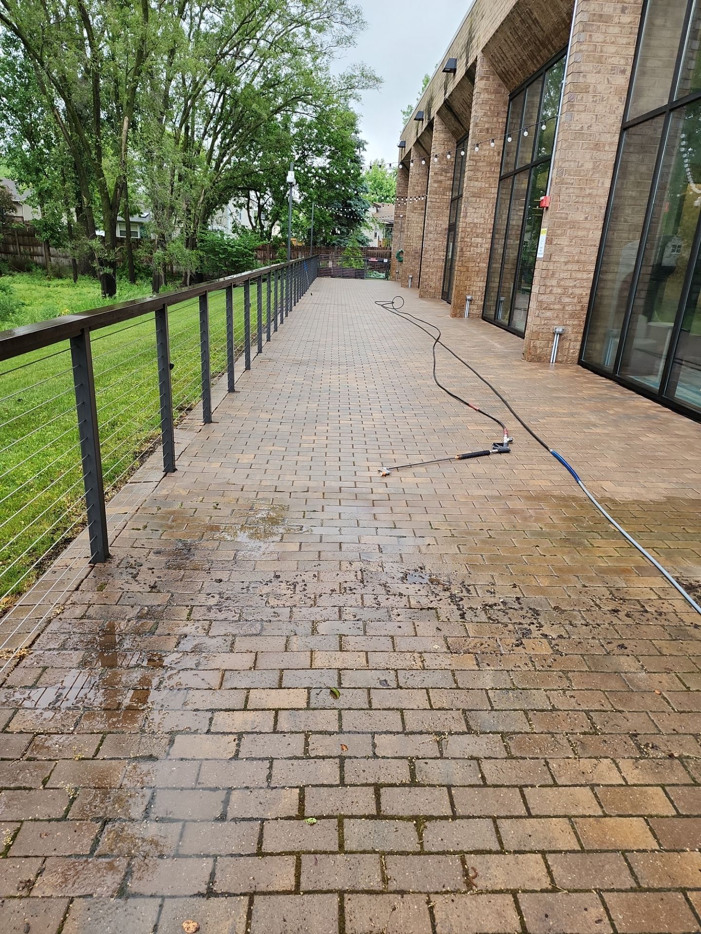 Brick paver repair, cleaning, sealing and poly sanding by Northern Power Washing LLC.