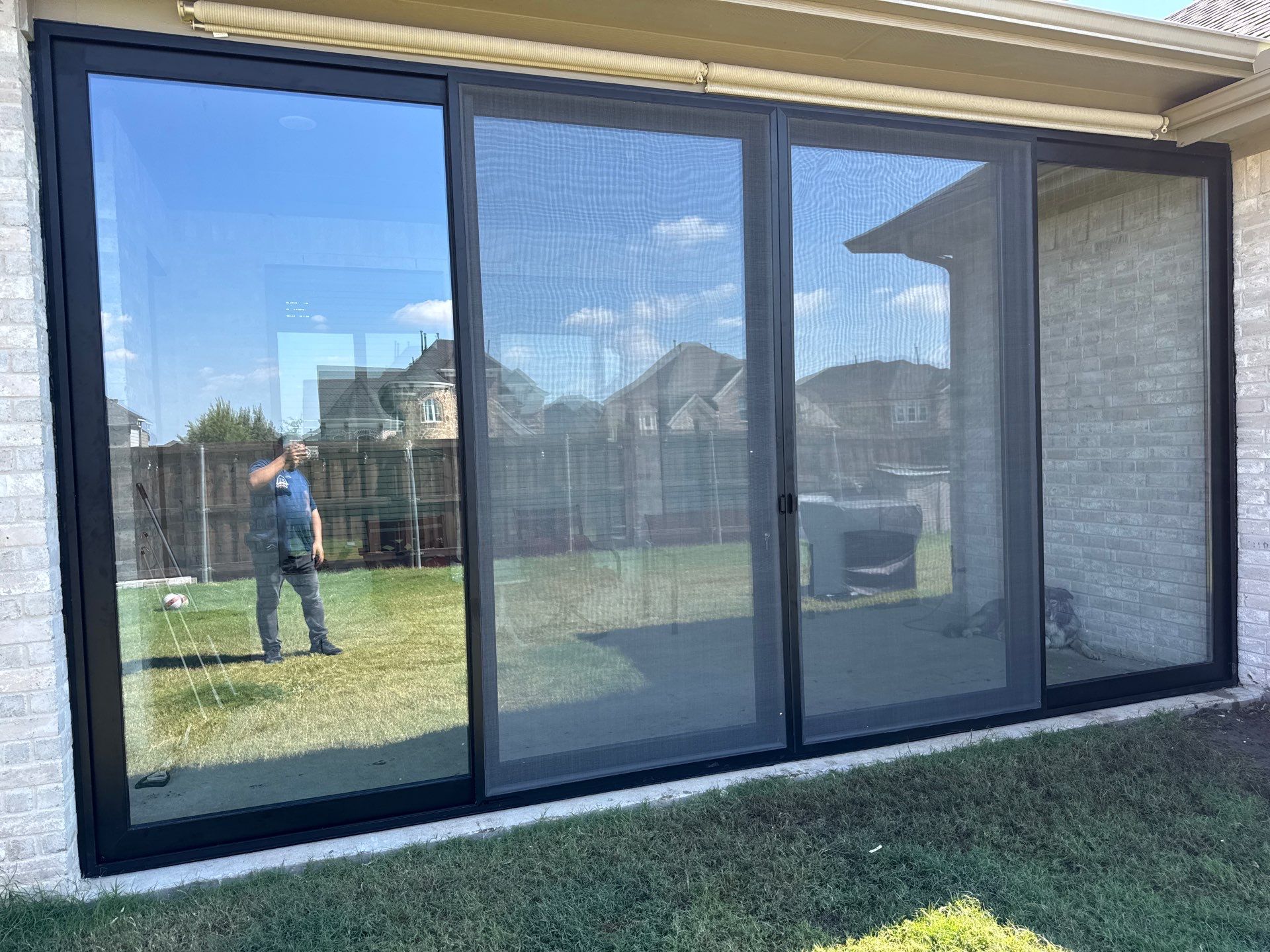Year-Round Bonus Room: Patio Enclosure Featuring 16ft Seamless Sliding Glass by Tibi Soli LLC