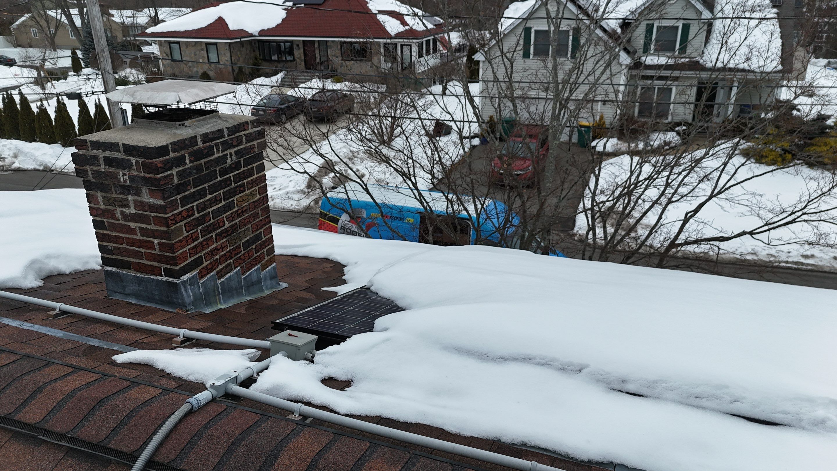 Ice Dam Removal & Snow Removal in Woburn, MA by Mighty Dog Roofing of Greater Middlesex County