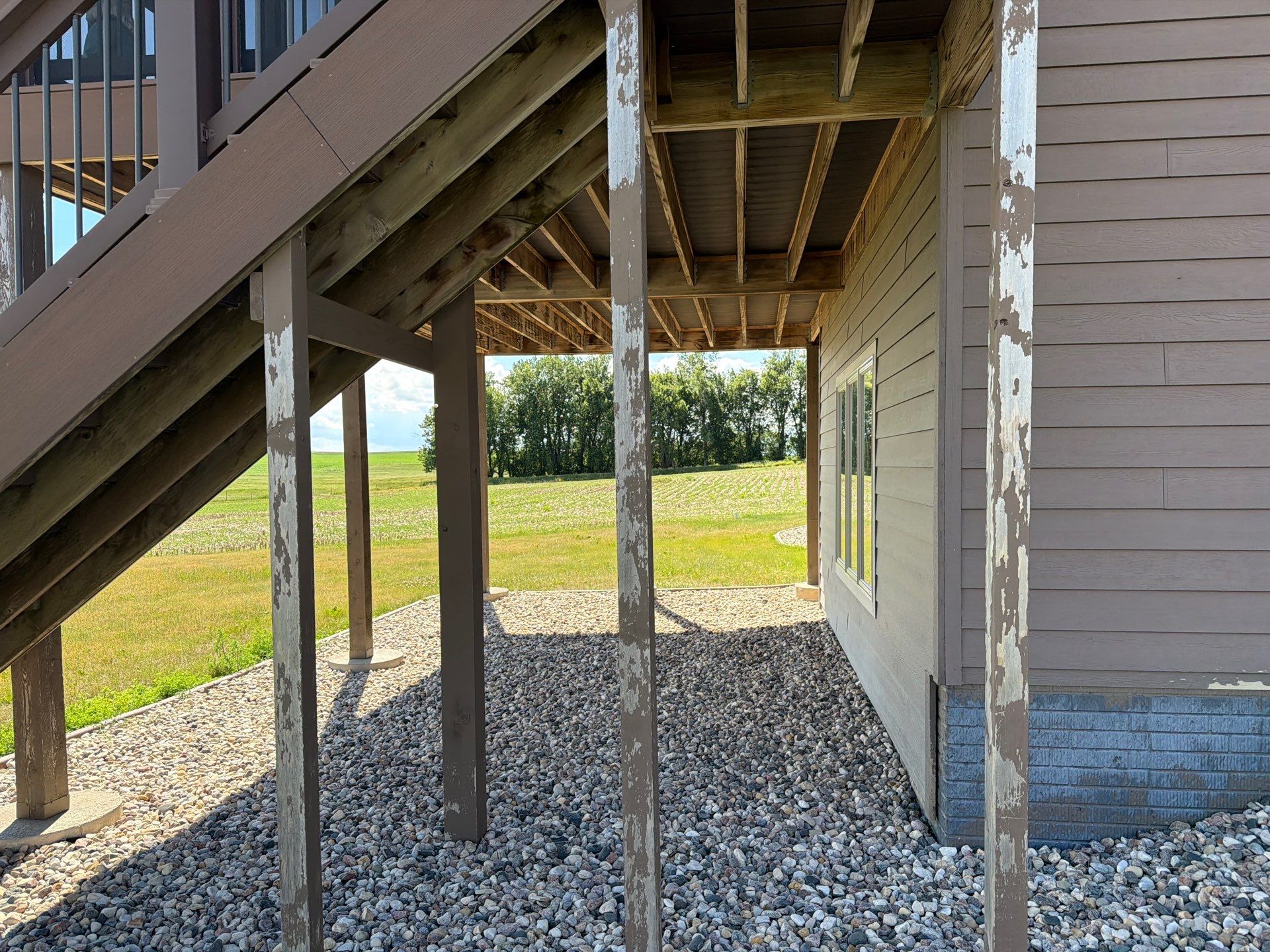 Full Exterior Siding Paint Restoration and Refresh in Garretson by Select Painting, Coatings & Garage Cabinets