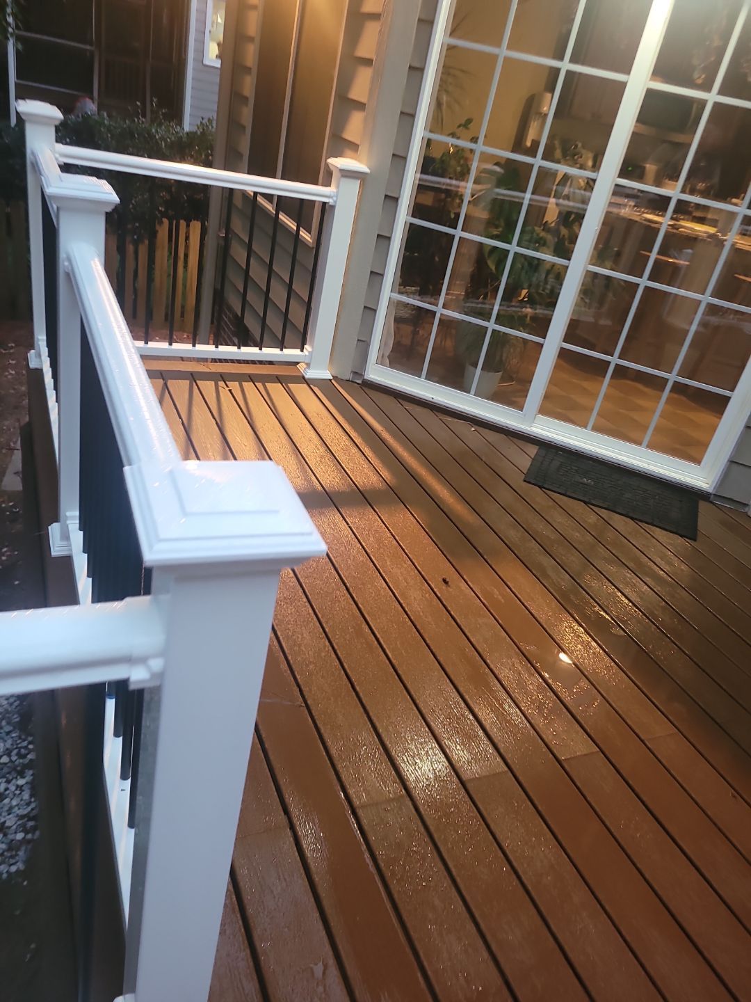 Fuquay-Varina Outdoor Upgrade – Composite Deck & Paved Landing by Elite Remodeling and Design LLC