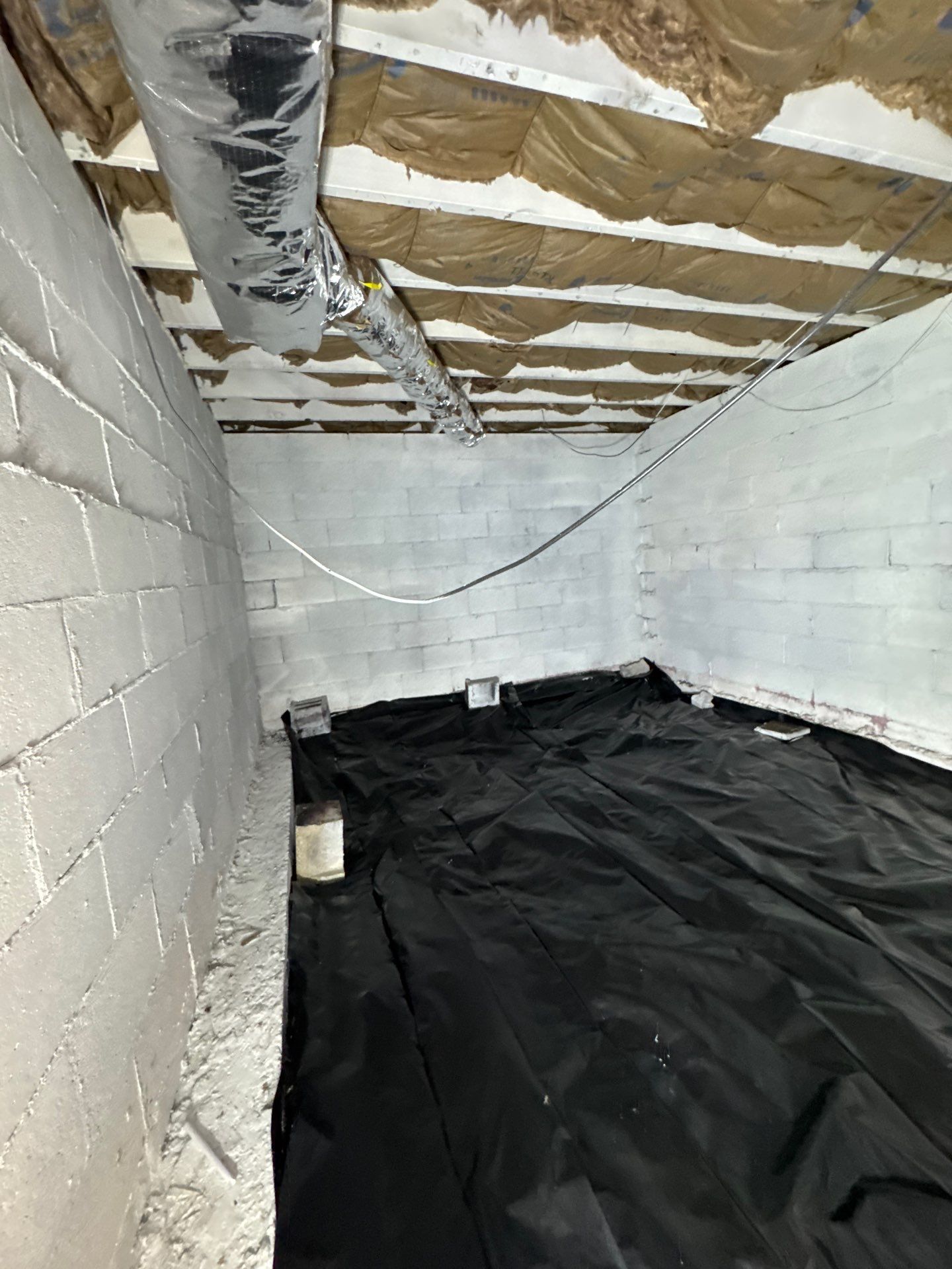 Crawlspace Mold Remediation and Vapor Barrier Installation in Watertown by Dry Source Property Restoration 
