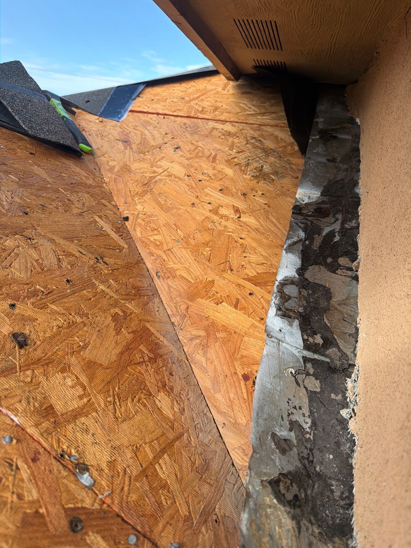 Flashing Stucco above the Roof by Bayfront Roofing and Construction