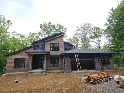 Gutter Installation using 5" Seamless Gutters and Downspouts